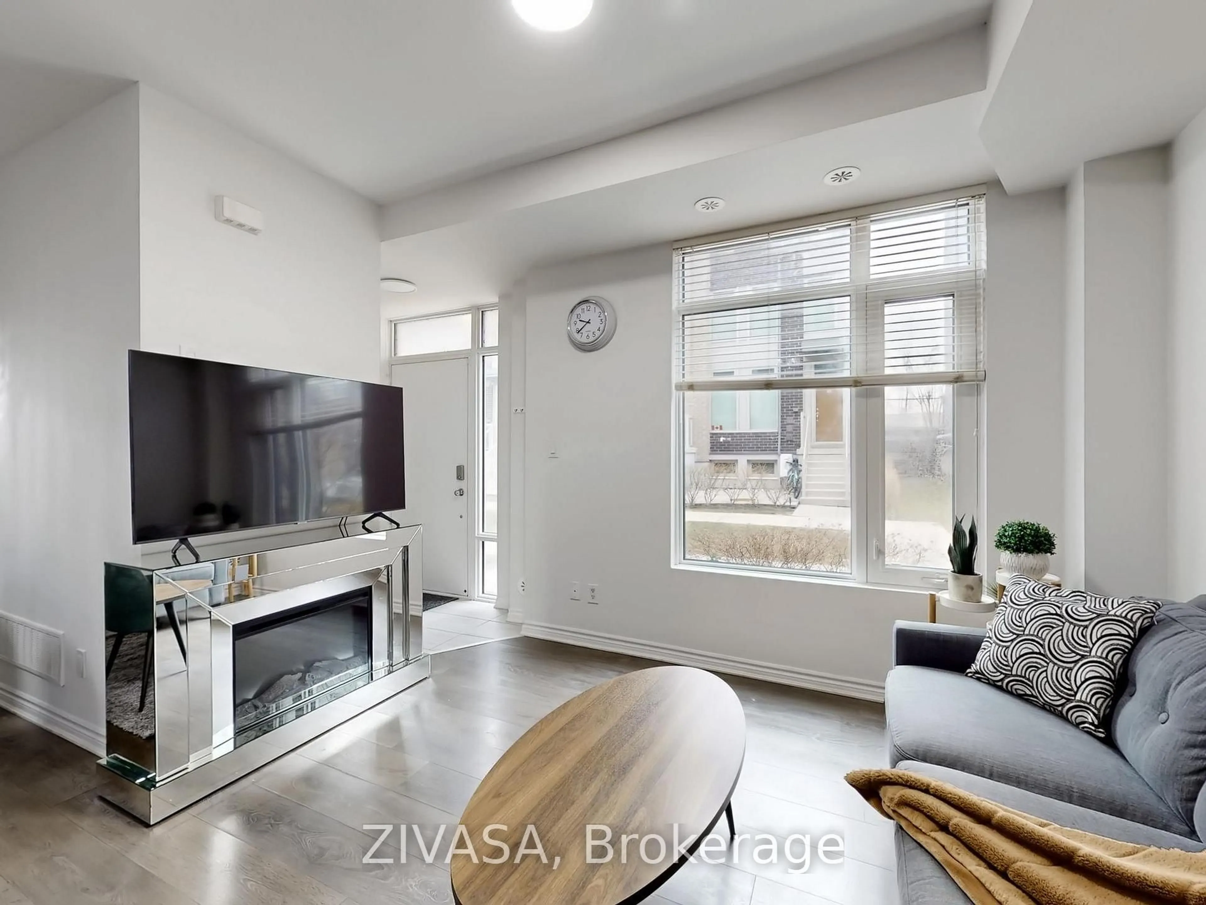 Living room with furniture, unknown for 15 Applewood Lane #92, Toronto Ontario M9C 2Z7