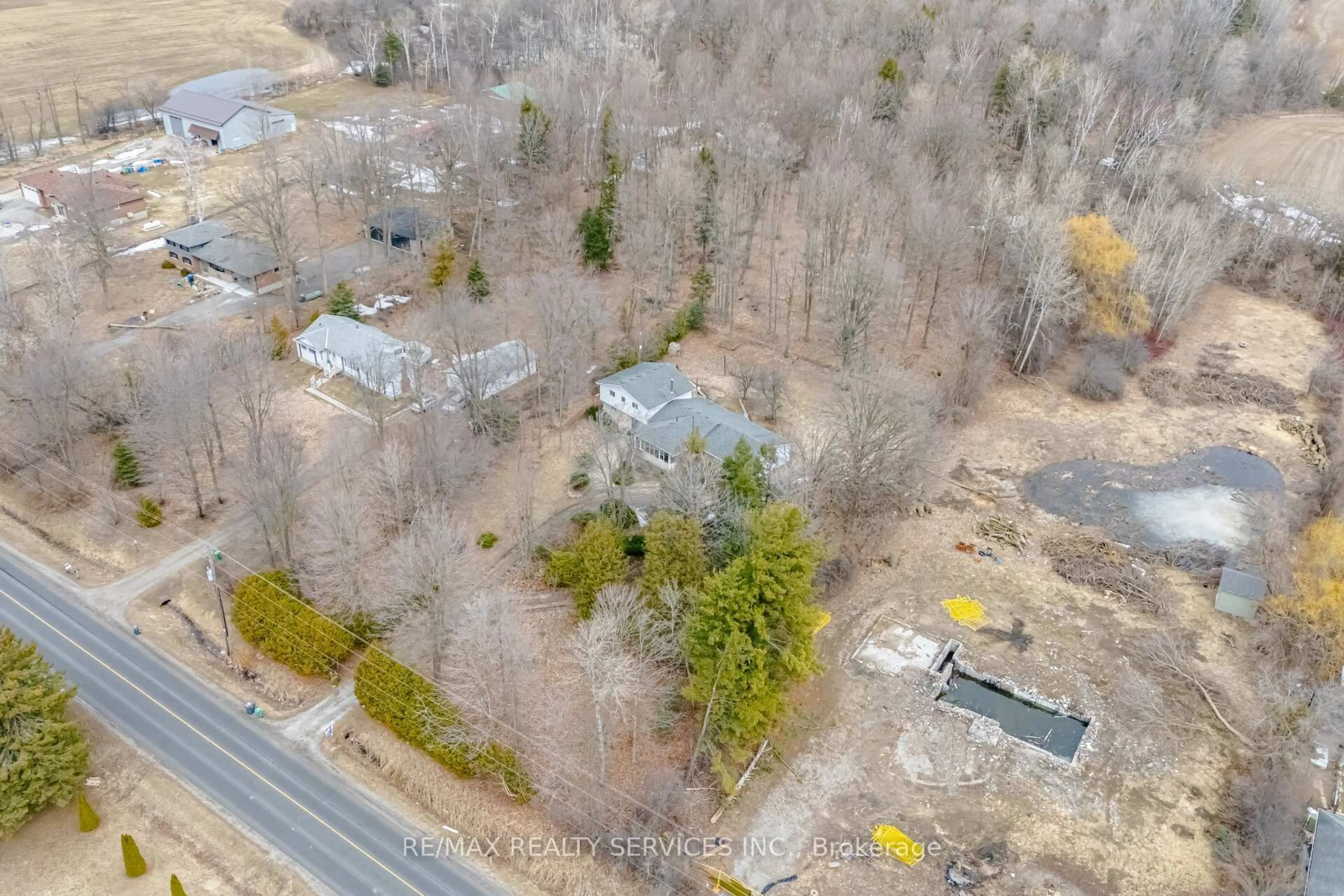 A pic from outside/outdoor area/front of a property/back of a property/a pic from drone, forest/trees view for 14411 Innis Lake Rd, Caledon Ontario L7C 2Z8