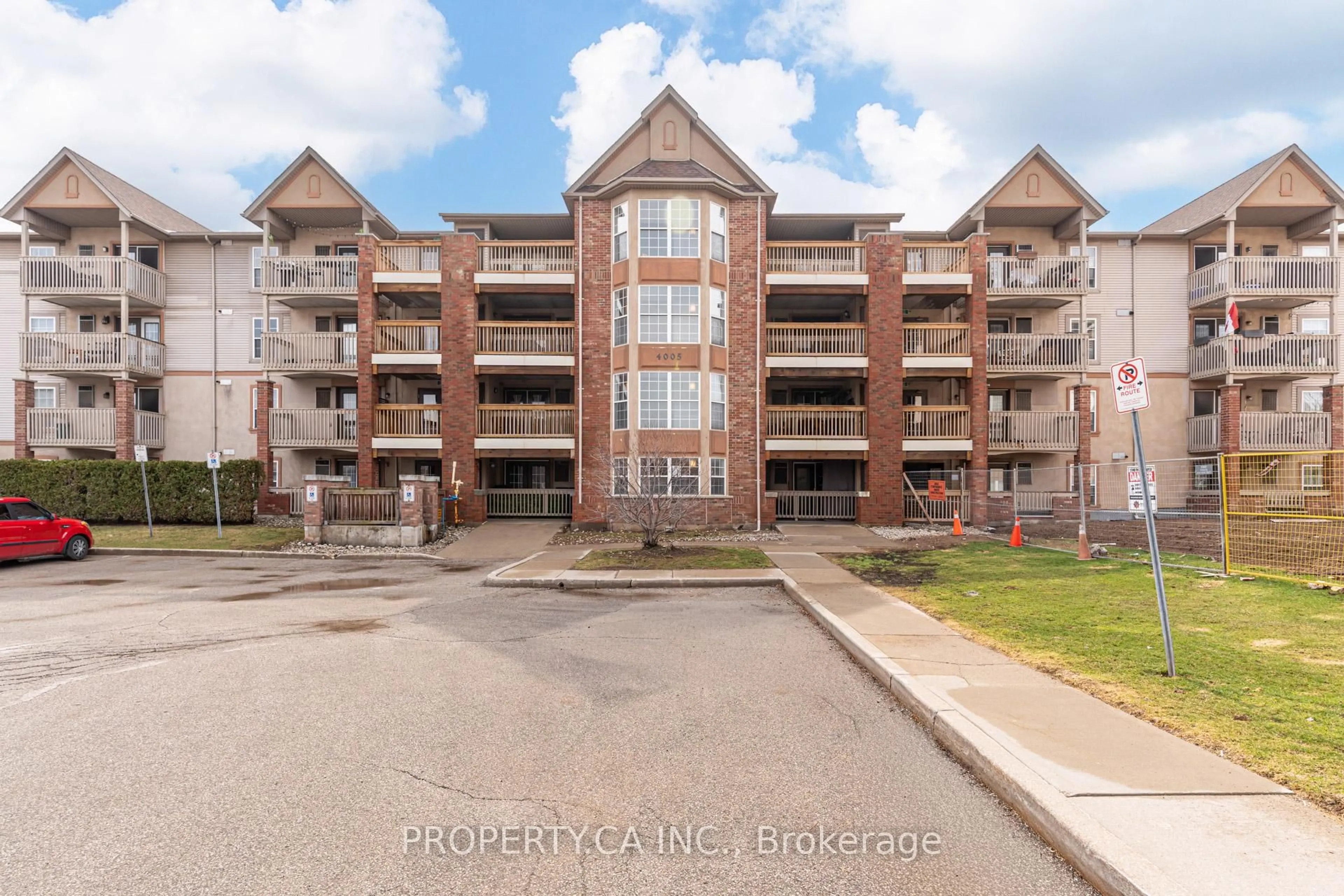 A pic from outside/outdoor area/front of a property/back of a property/a pic from drone, water/lake/river/ocean view for 4005 Kilmer Dr #210, Burlington Ontario L7M 4M2