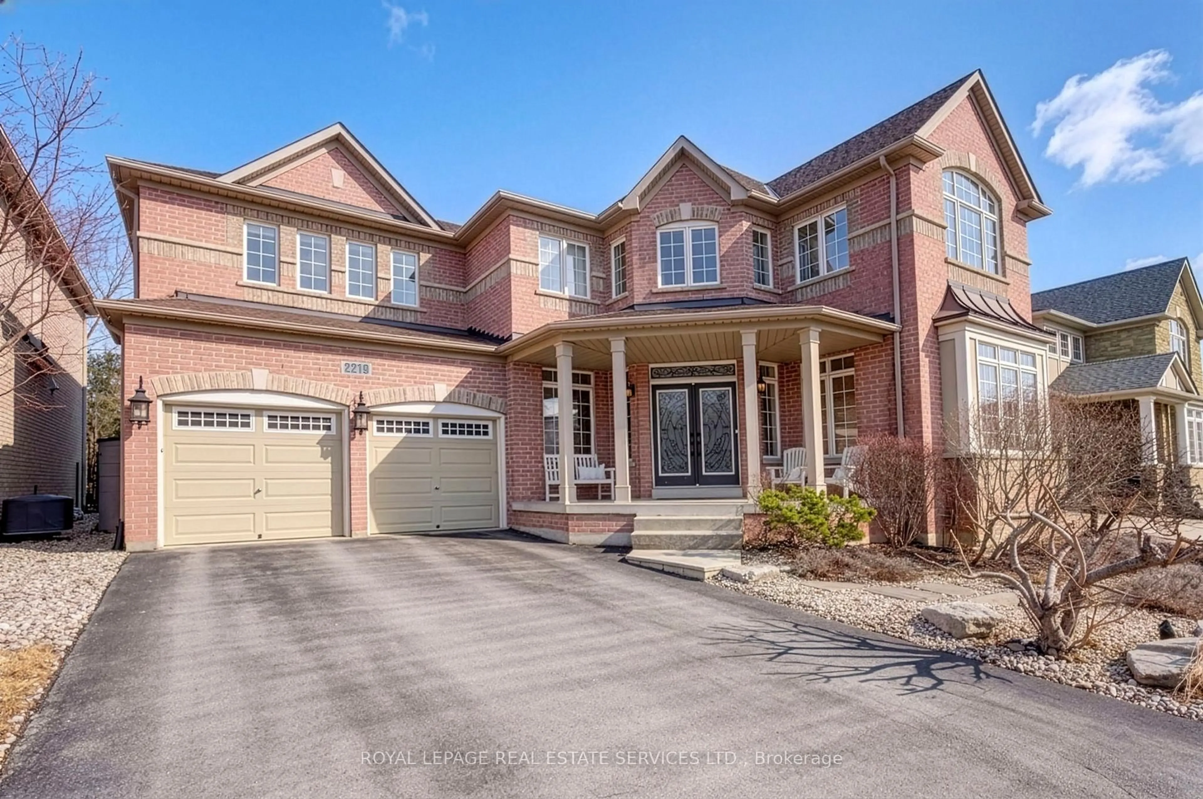 Home with brick exterior material, street for 2219 Wuthering Heights Way, Oakville Ontario L6M 0A3