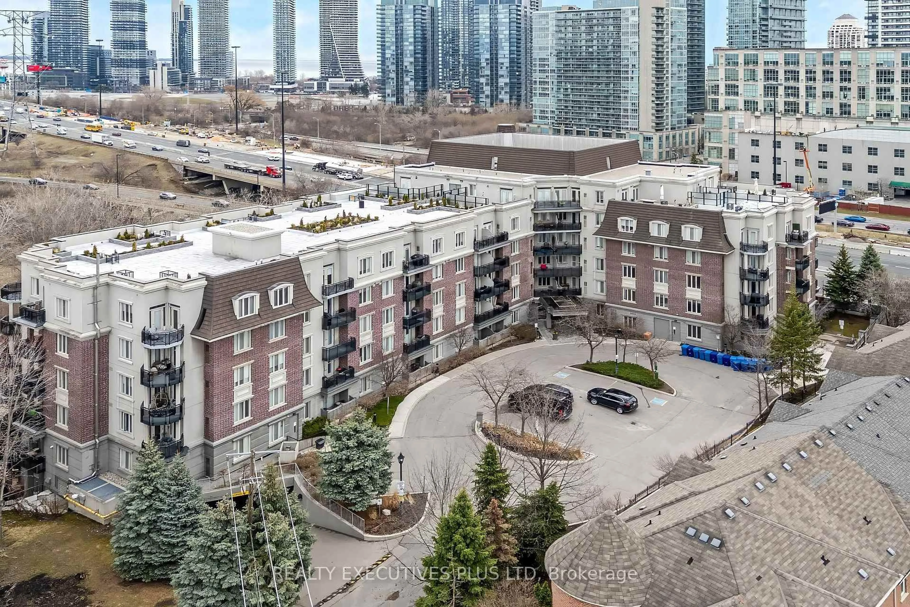A pic from outside/outdoor area/front of a property/back of a property/a pic from drone, city buildings view from balcony for 245 Dalesford Rd #414, Toronto Ontario M8Y 4H7