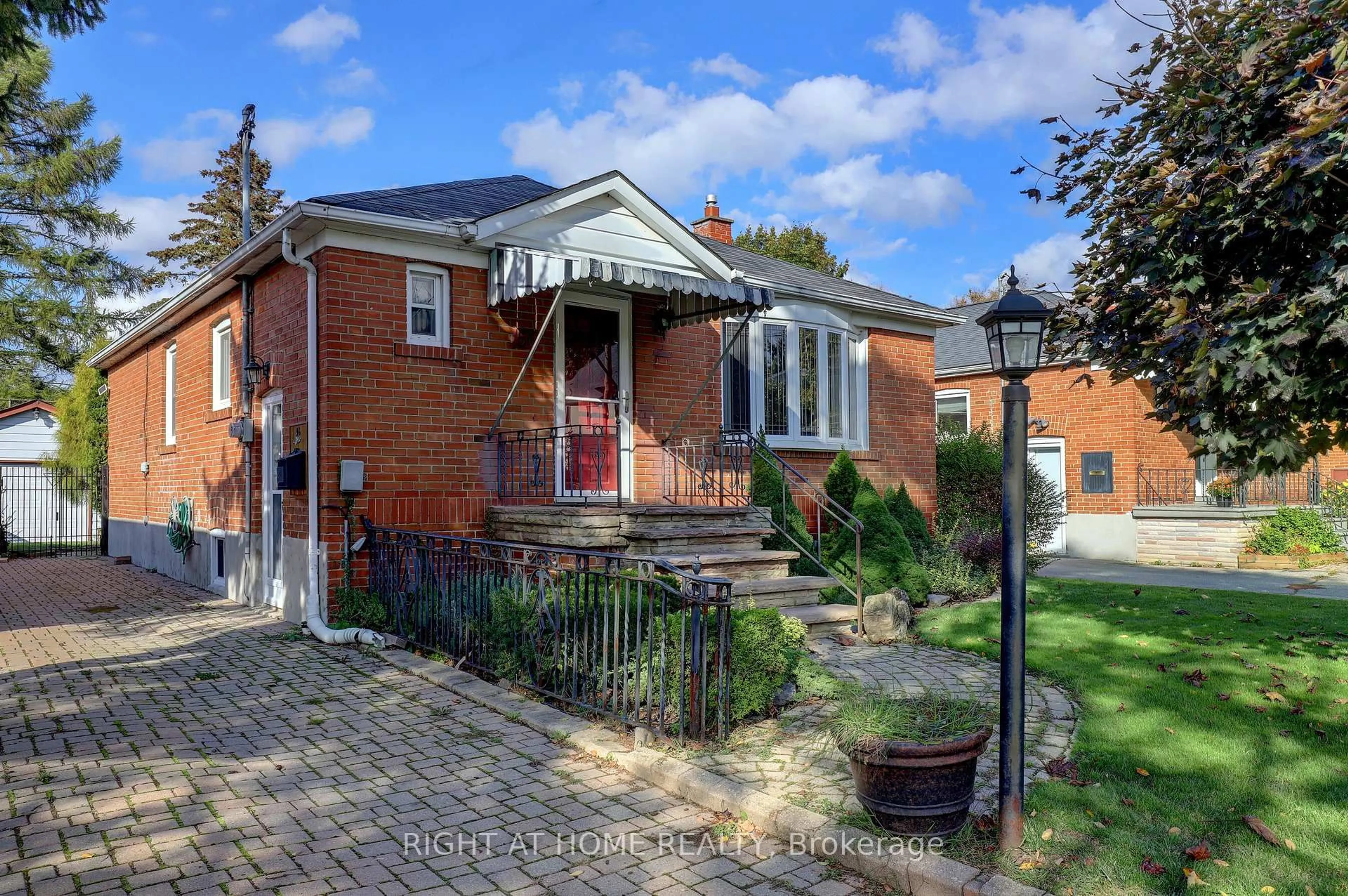 Home with brick exterior material, street for 56 Cynthia Rd, Toronto Ontario M6N 2P9