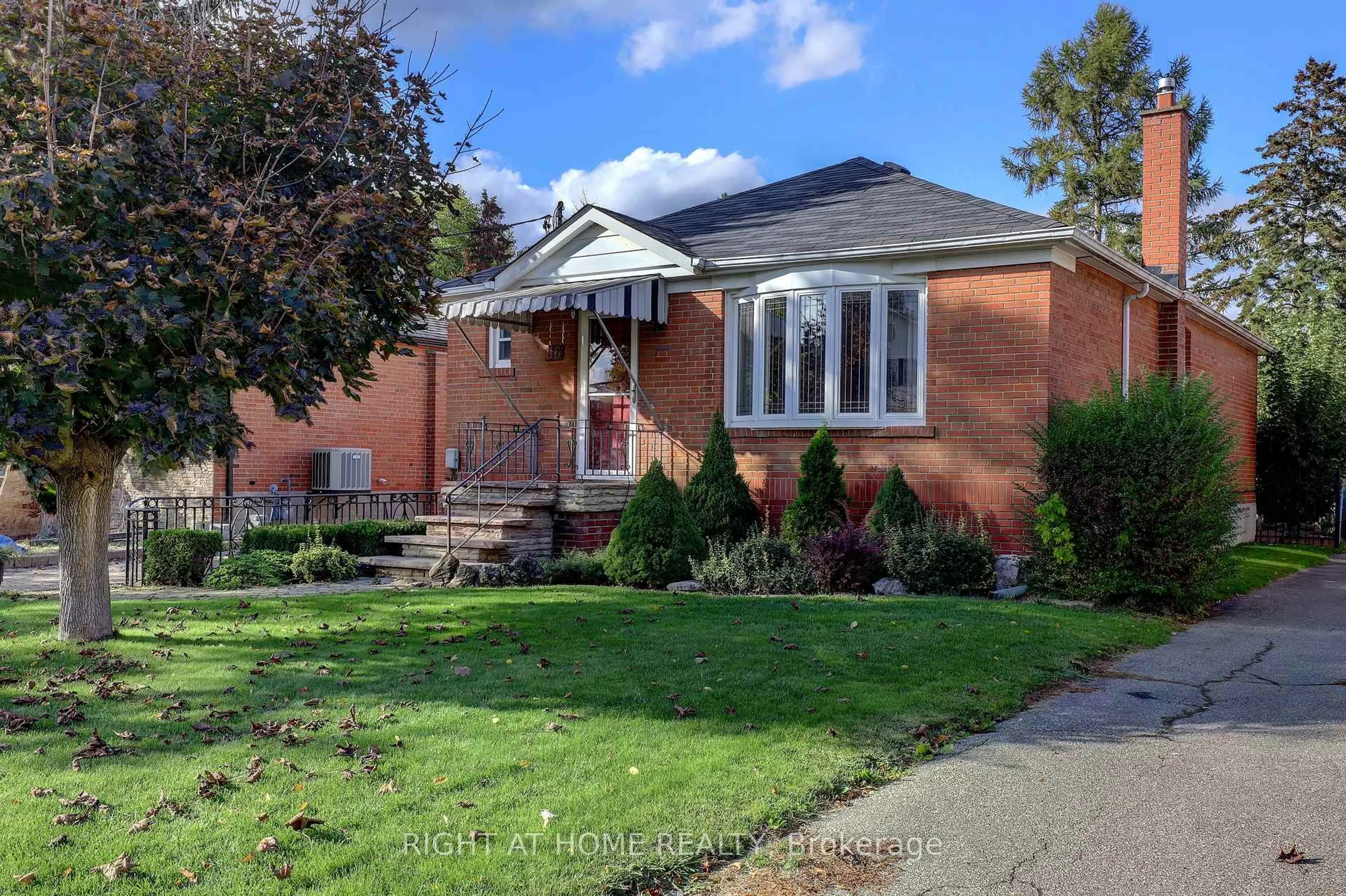 Home with brick exterior material, street for 56 Cynthia Rd, Toronto Ontario M6N 2P9