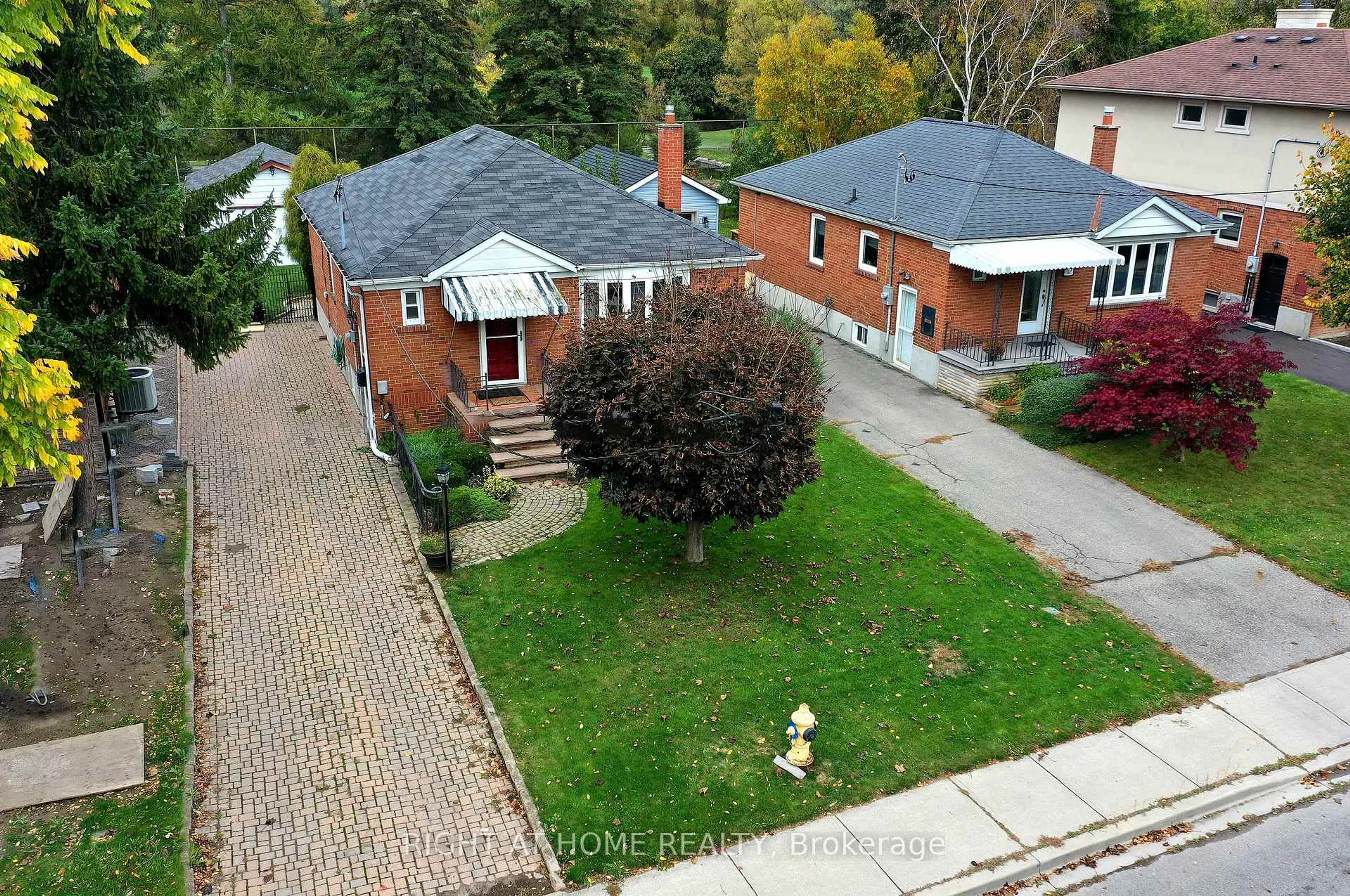 A pic from outside/outdoor area/front of a property/back of a property/a pic from drone, street for 56 Cynthia Rd, Toronto Ontario M6N 2P9