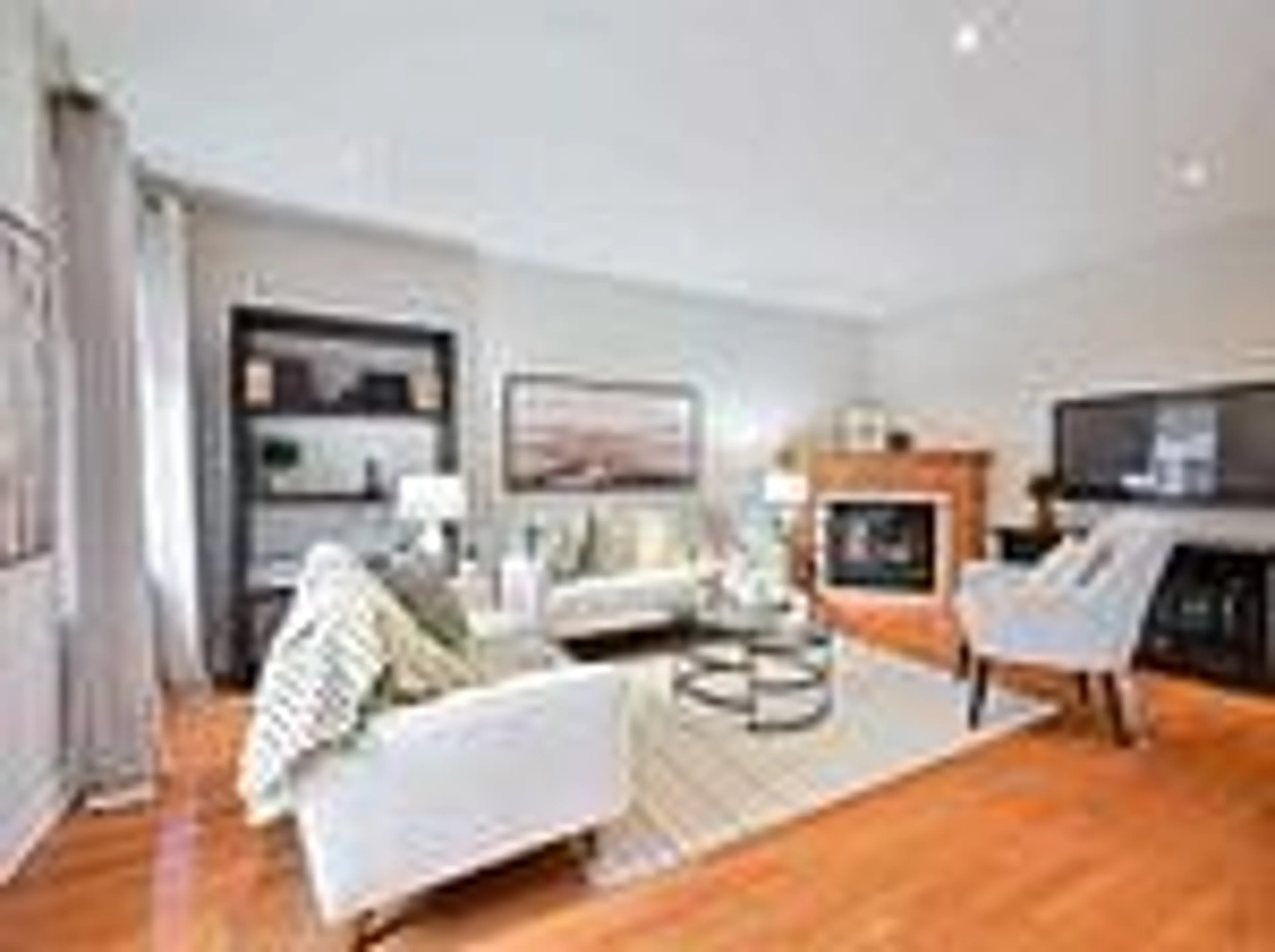 Living room with furniture, wood/laminate floor for 814 Brass Winds Pl, Mississauga Ontario L5W 1T4