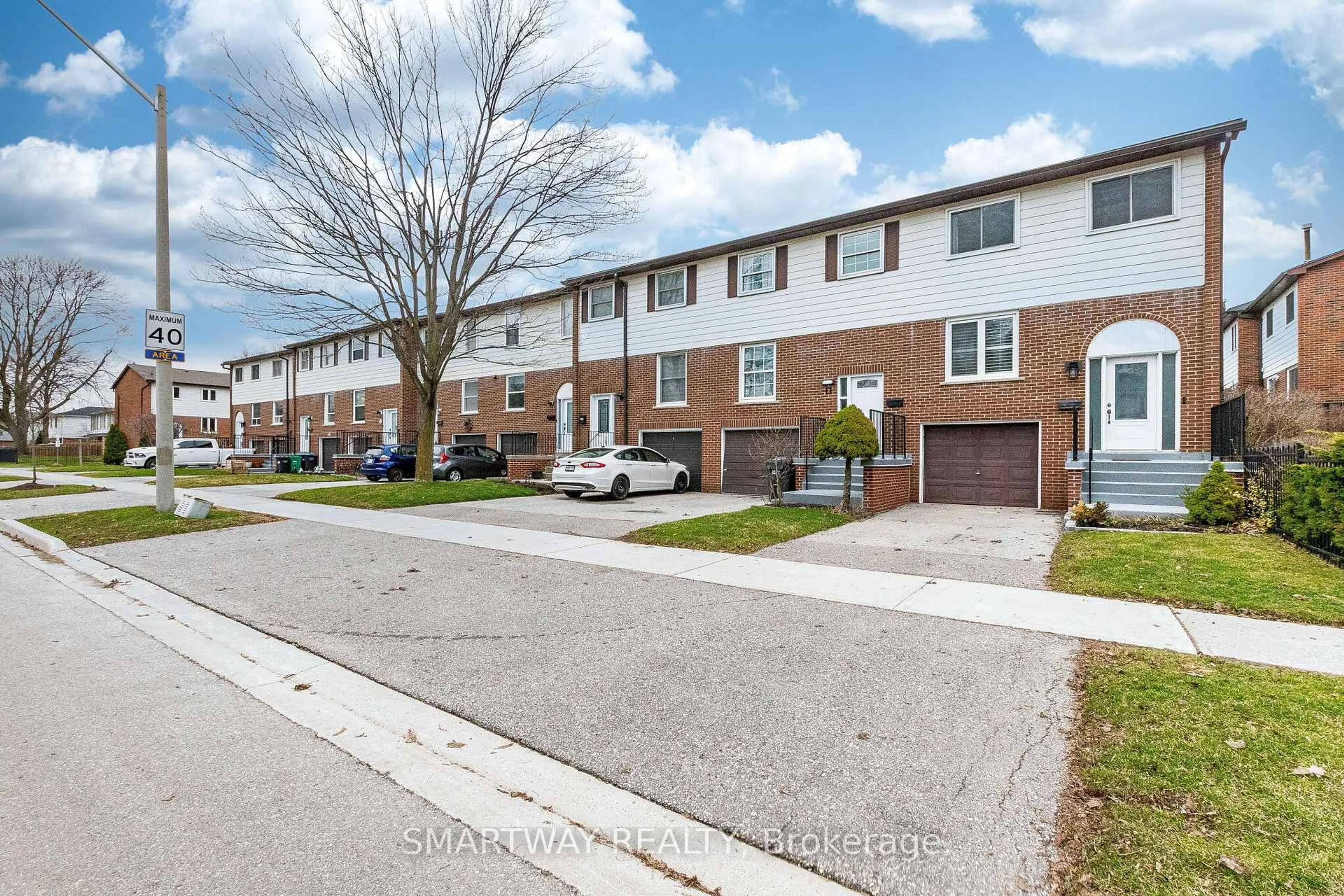 A pic from outside/outdoor area/front of a property/back of a property/a pic from drone, street for 2445 Homelands Dr #10, Mississauga Ontario L5K 2C6