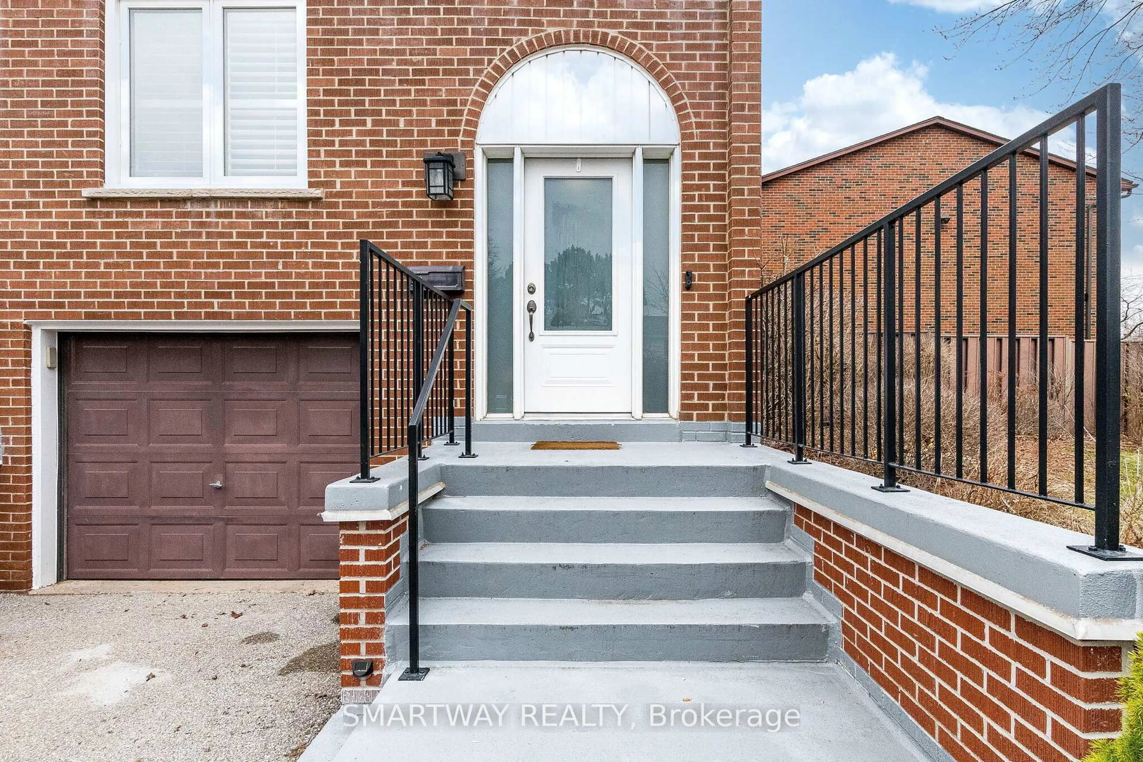 Home with brick exterior material, street for 2445 Homelands Dr #10, Mississauga Ontario L5K 2C6