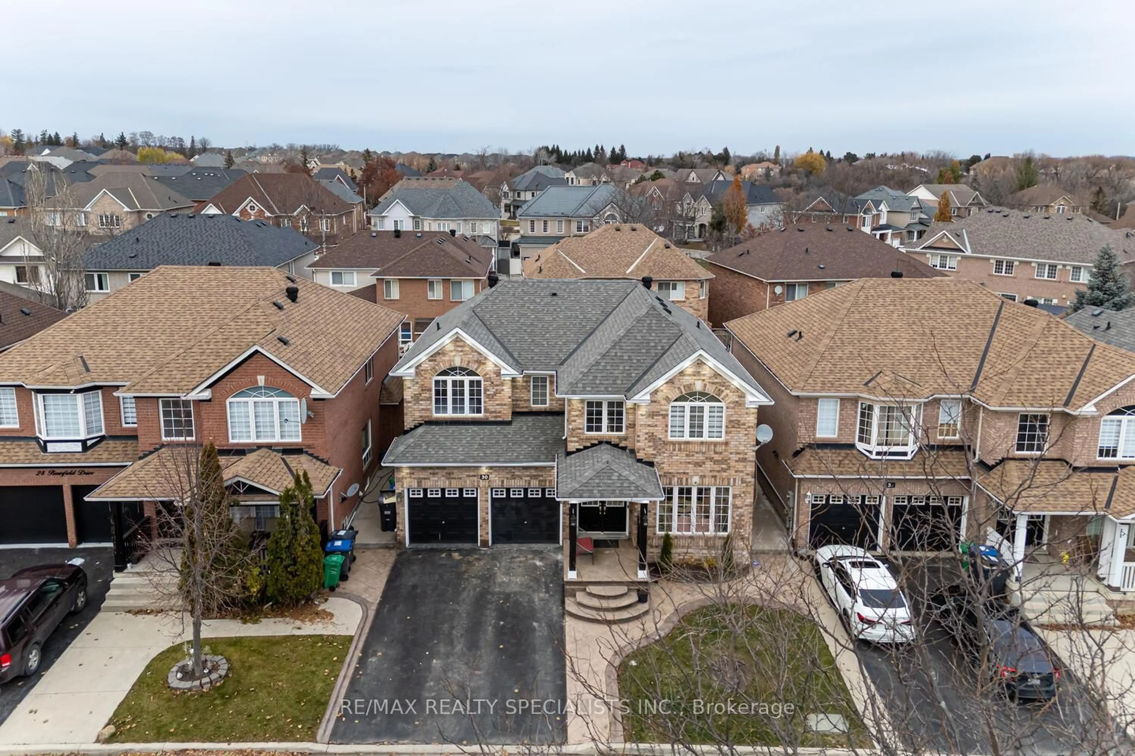 A pic from outside/outdoor area/front of a property/back of a property/a pic from drone, street for 30 Bowsfield Dr, Brampton Ontario L6P 1A6