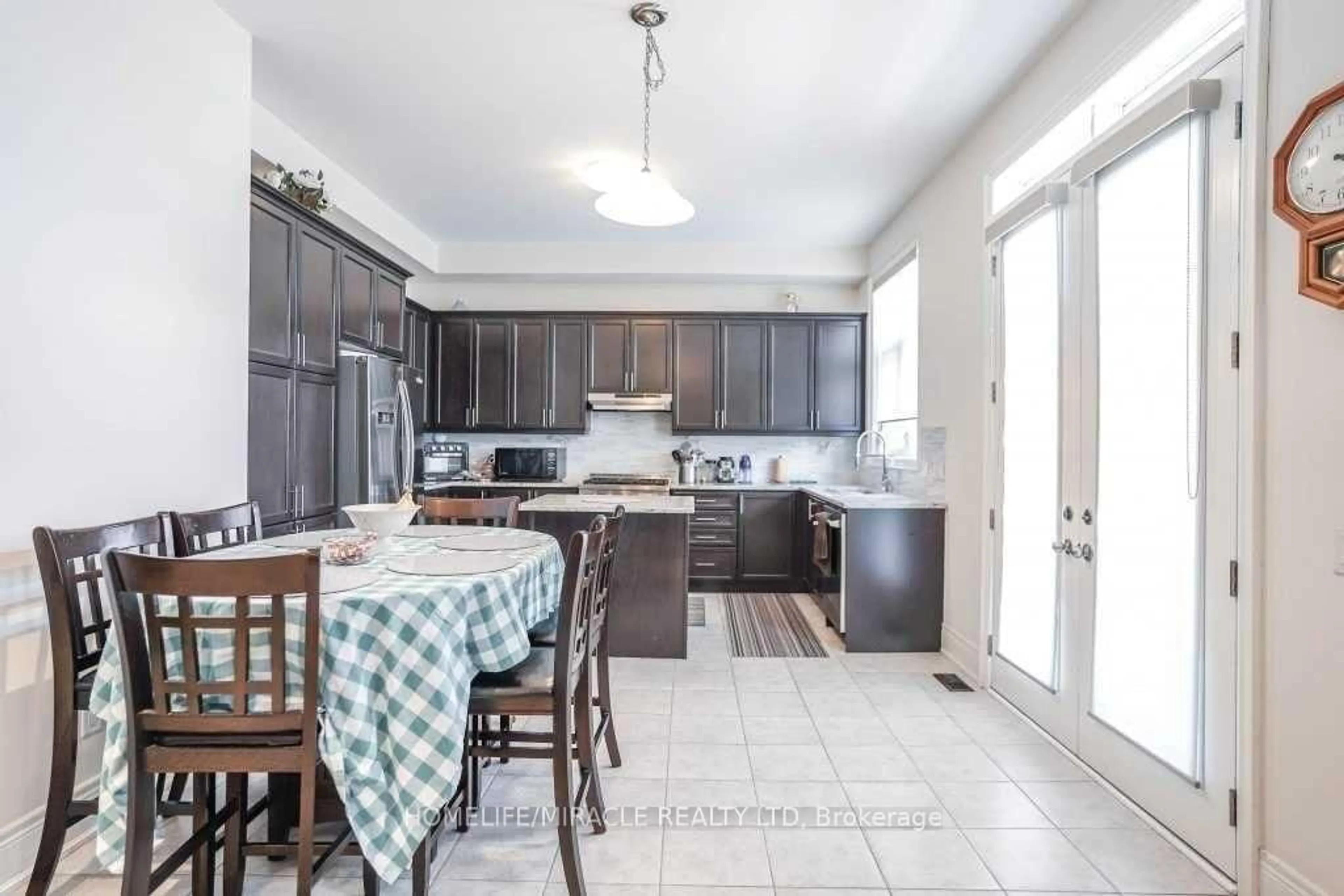 Open concept kitchen, ceramic/tile floor for 16 Lyle Way, Brampton Ontario L6X 5P8
