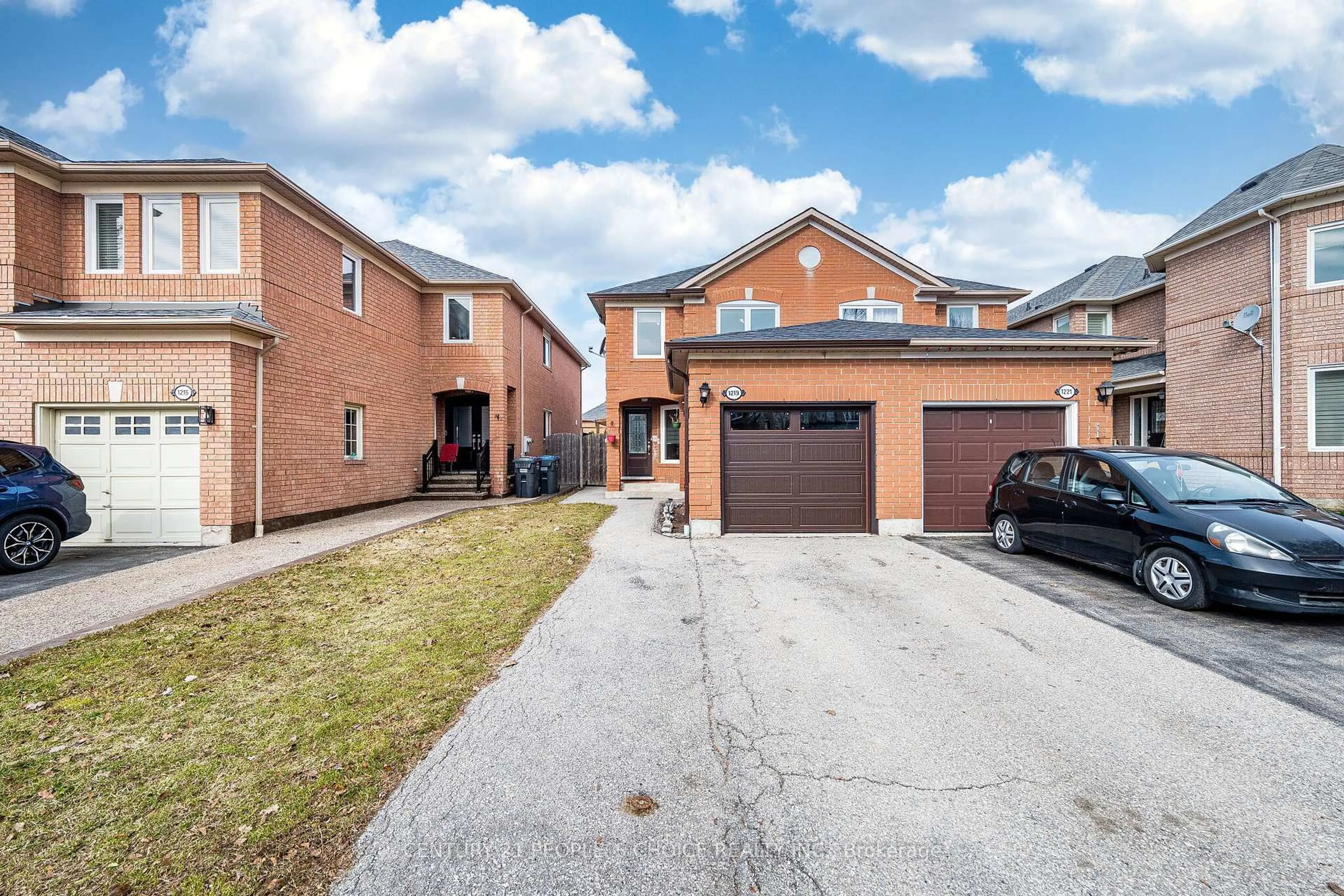 Home with brick exterior material, street for 1219 Quest Circ, Mississauga Ontario L5N 8B9