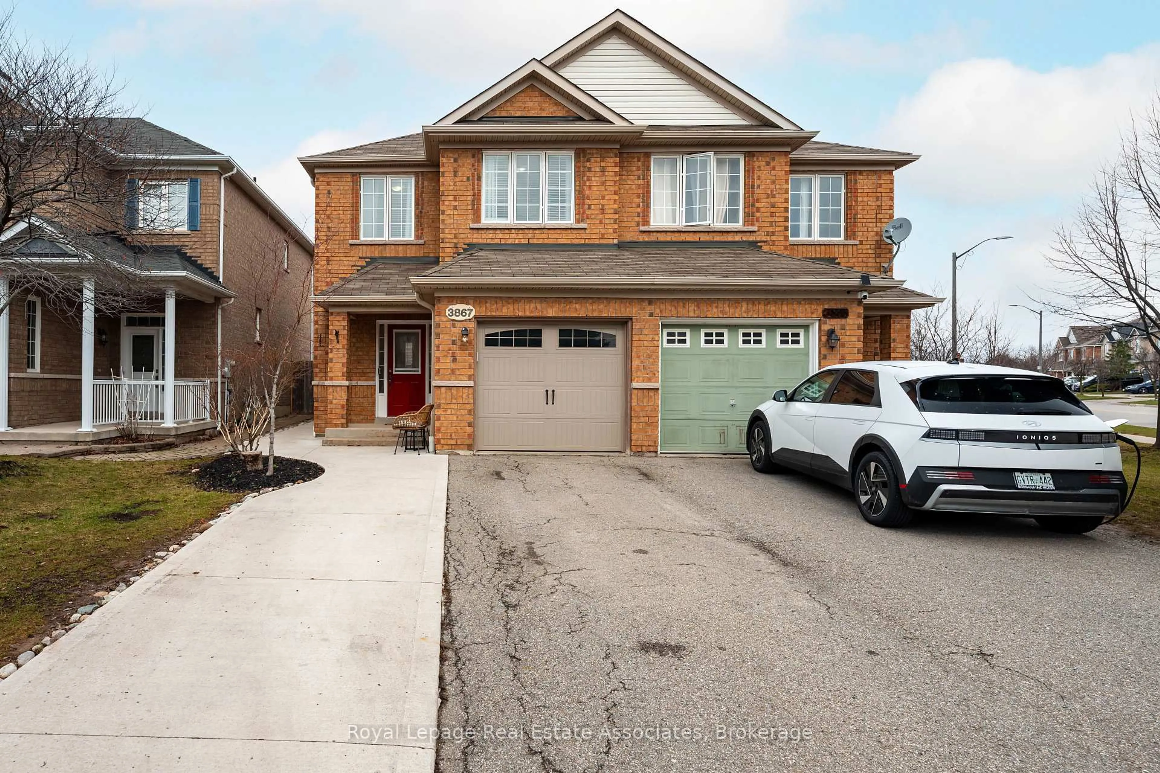Home with brick exterior material, street for 3867 Stardust Dr, Mississauga Ontario L5M 7Z9