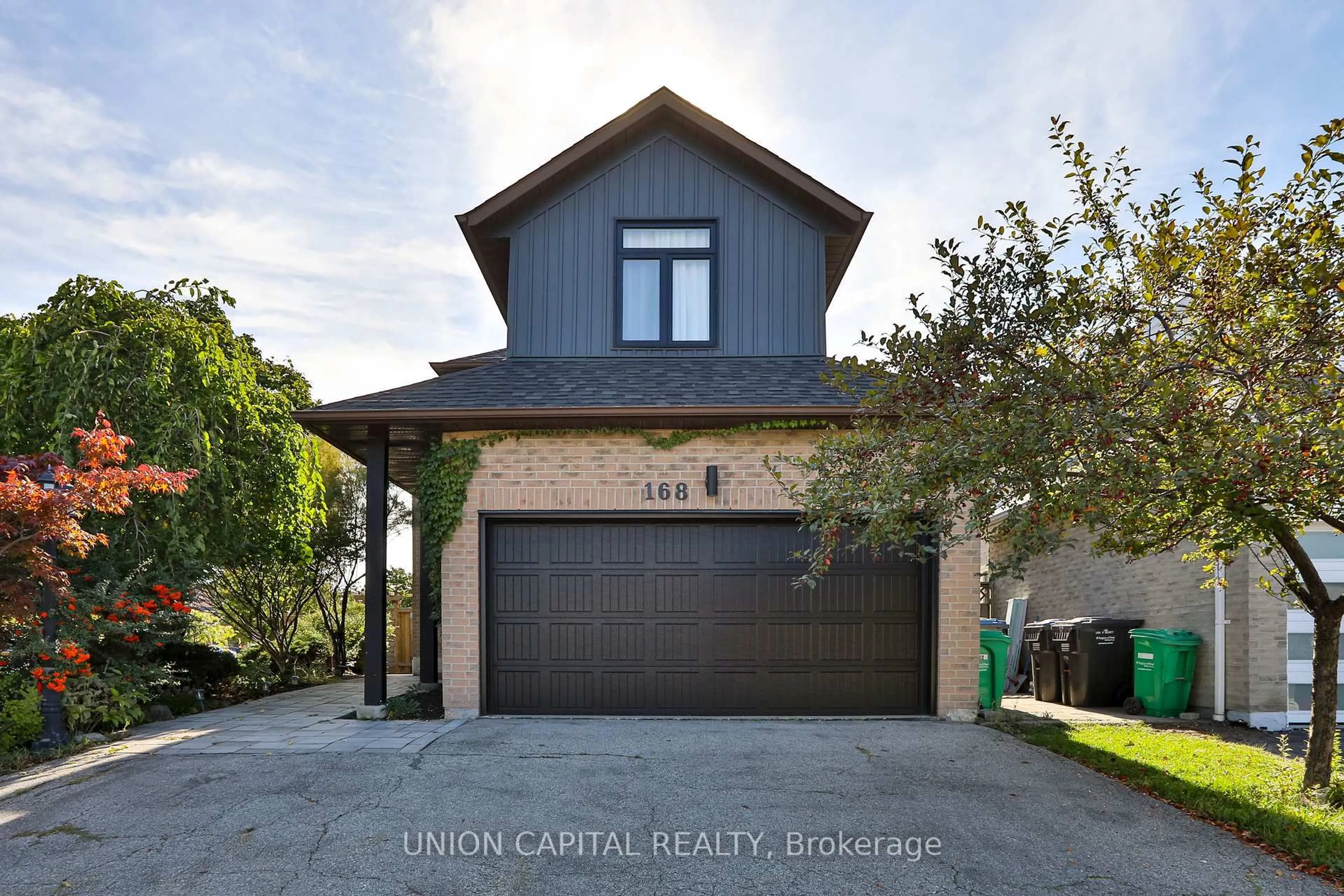 Home with brick exterior material, street for 168 Kingsbridge Garden Circ, Mississauga Ontario L5R 1T5