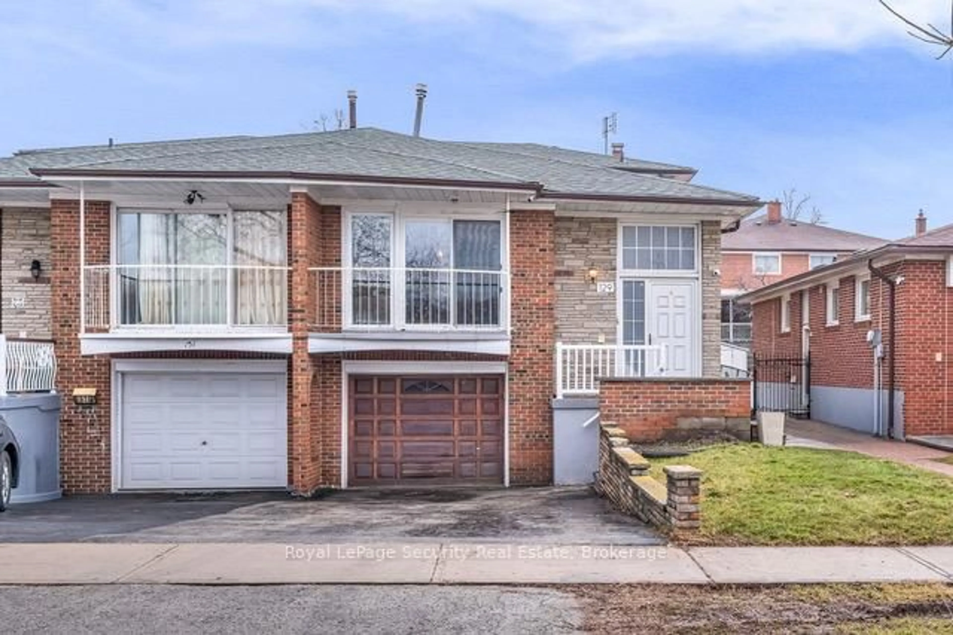 Home with brick exterior material, street for 129 Milady Rd, Toronto Ontario M9L 2J1