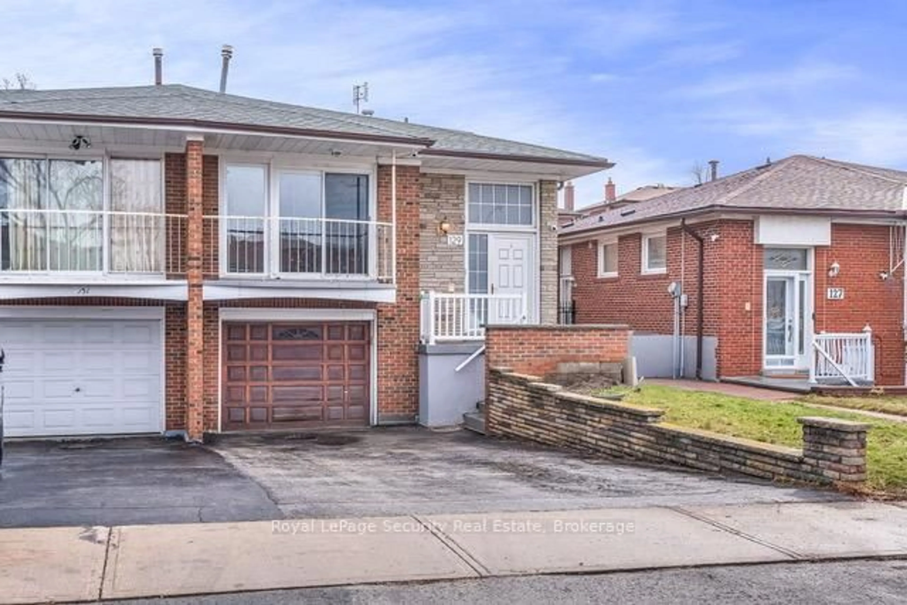 Home with brick exterior material, street for 129 Milady Rd, Toronto Ontario M9L 2J1