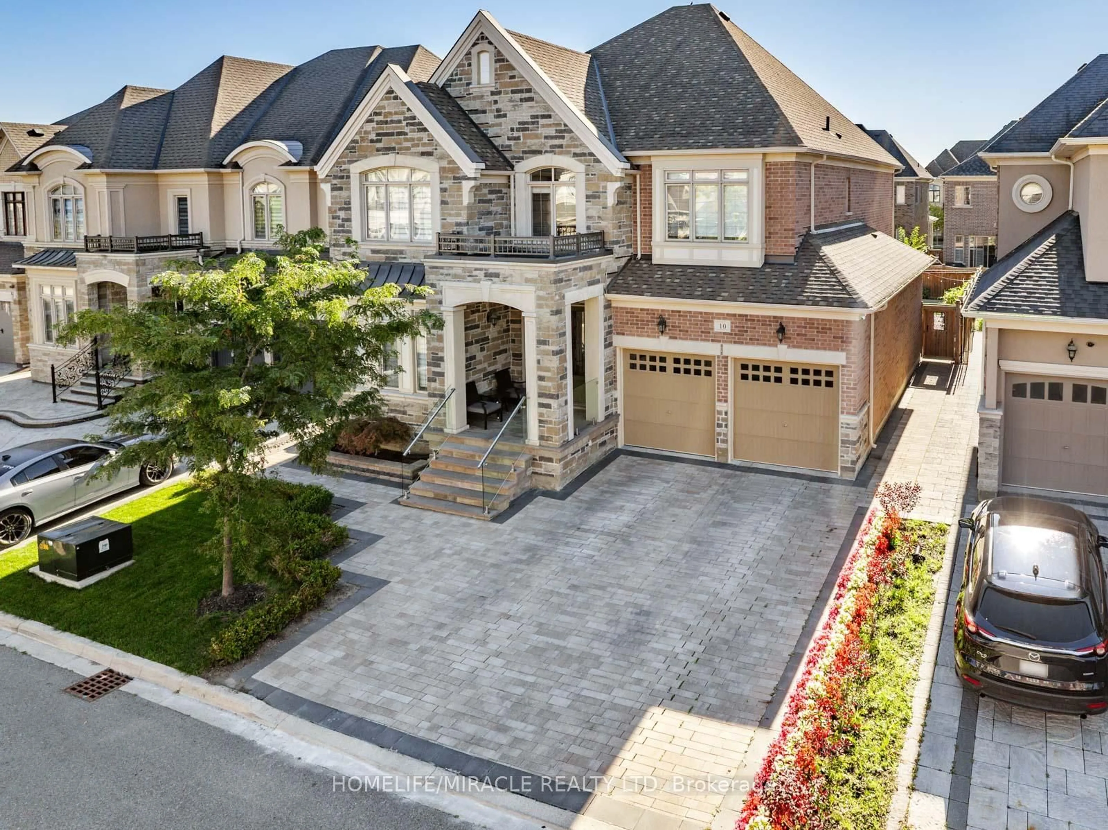 Home with brick exterior material, street for 10 Erintown Cres, Brampton Ontario L6P 4H2