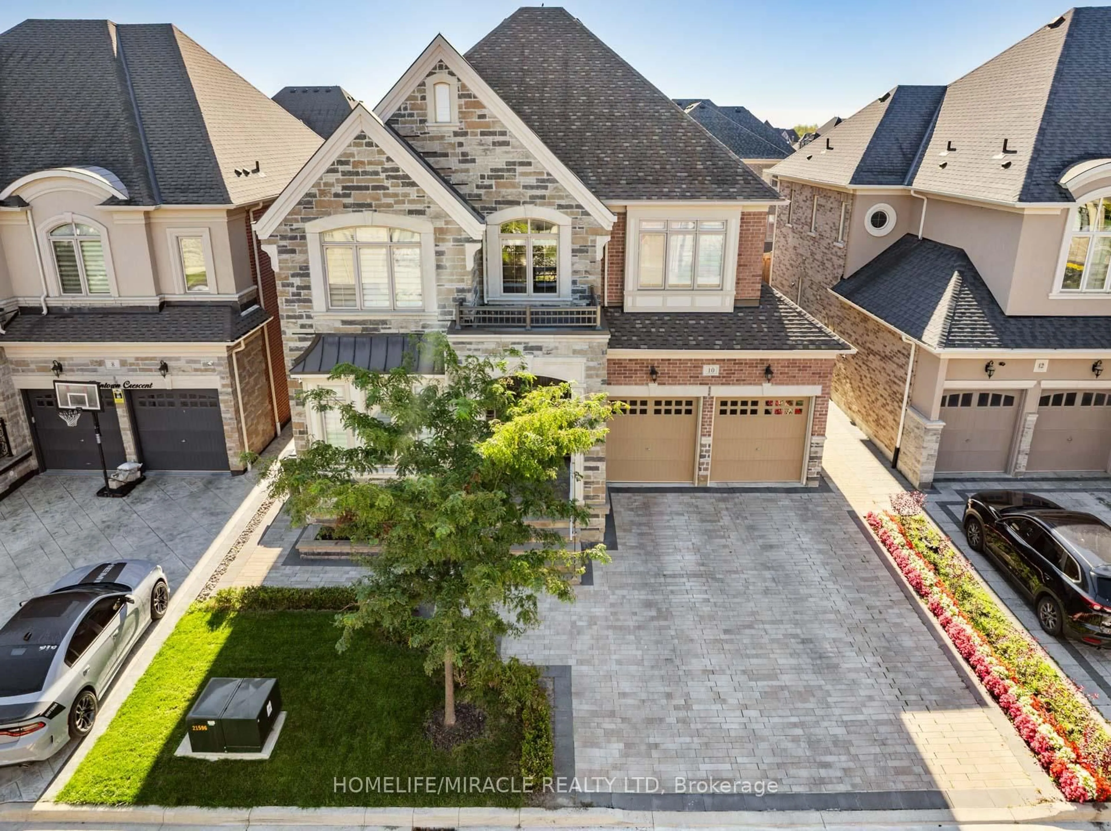 Home with brick exterior material, street for 10 Erintown Cres, Brampton Ontario L6P 4H2