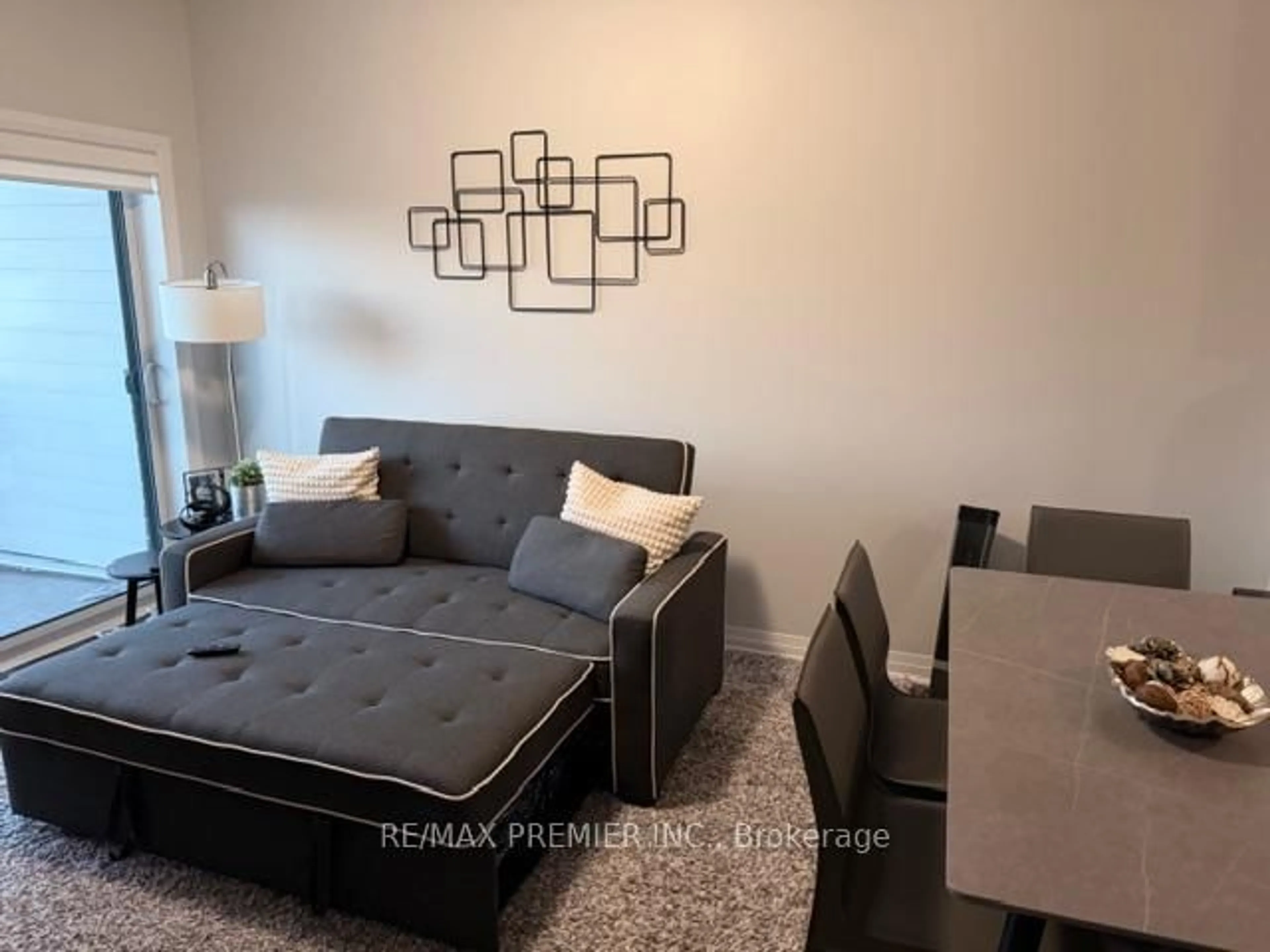 Living room with furniture, unknown for 102 Grovewood Common #421, Oakville Ontario L6H 0X2