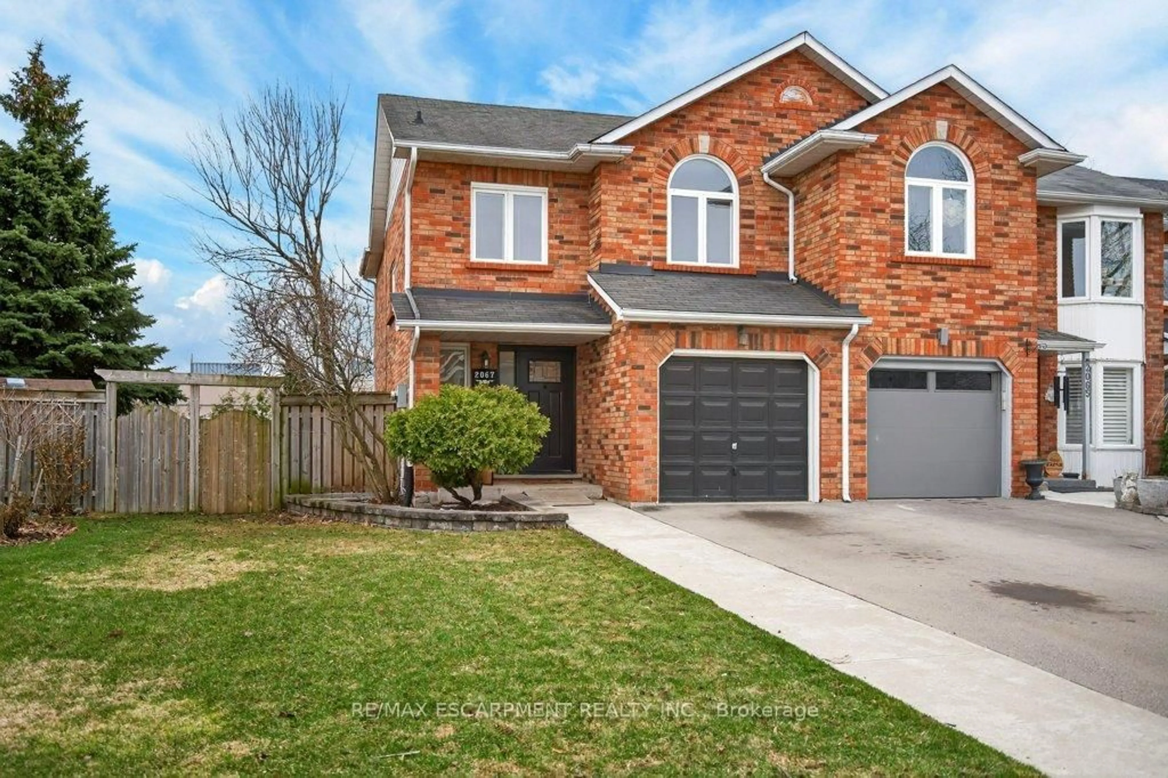 Home with brick exterior material, street for 2067 Chrisdon Rd, Burlington Ontario L7M 3W9