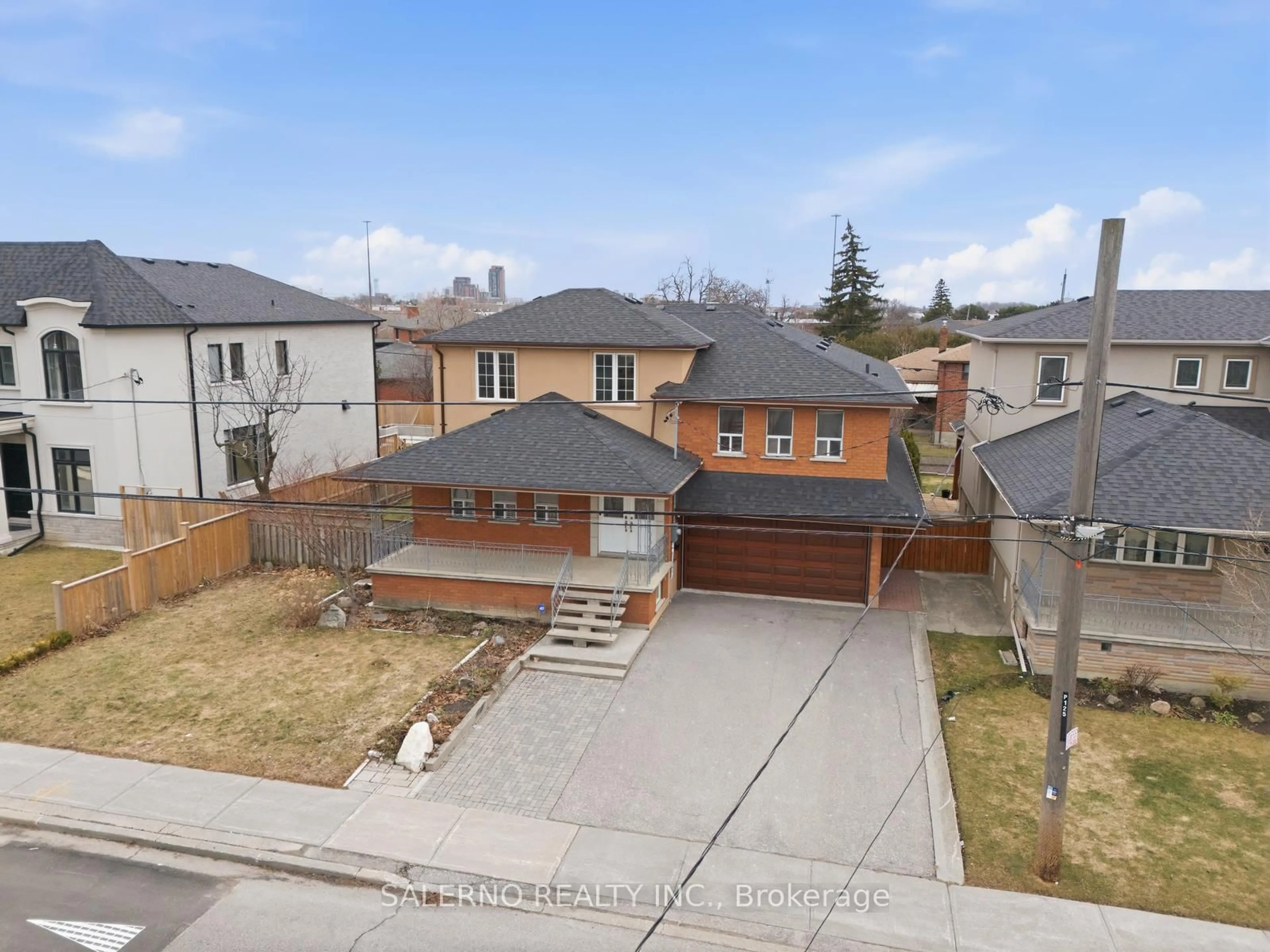 A pic from outside/outdoor area/front of a property/back of a property/a pic from drone, street for 125 Anthony Rd, Toronto Ontario M3K 1B7