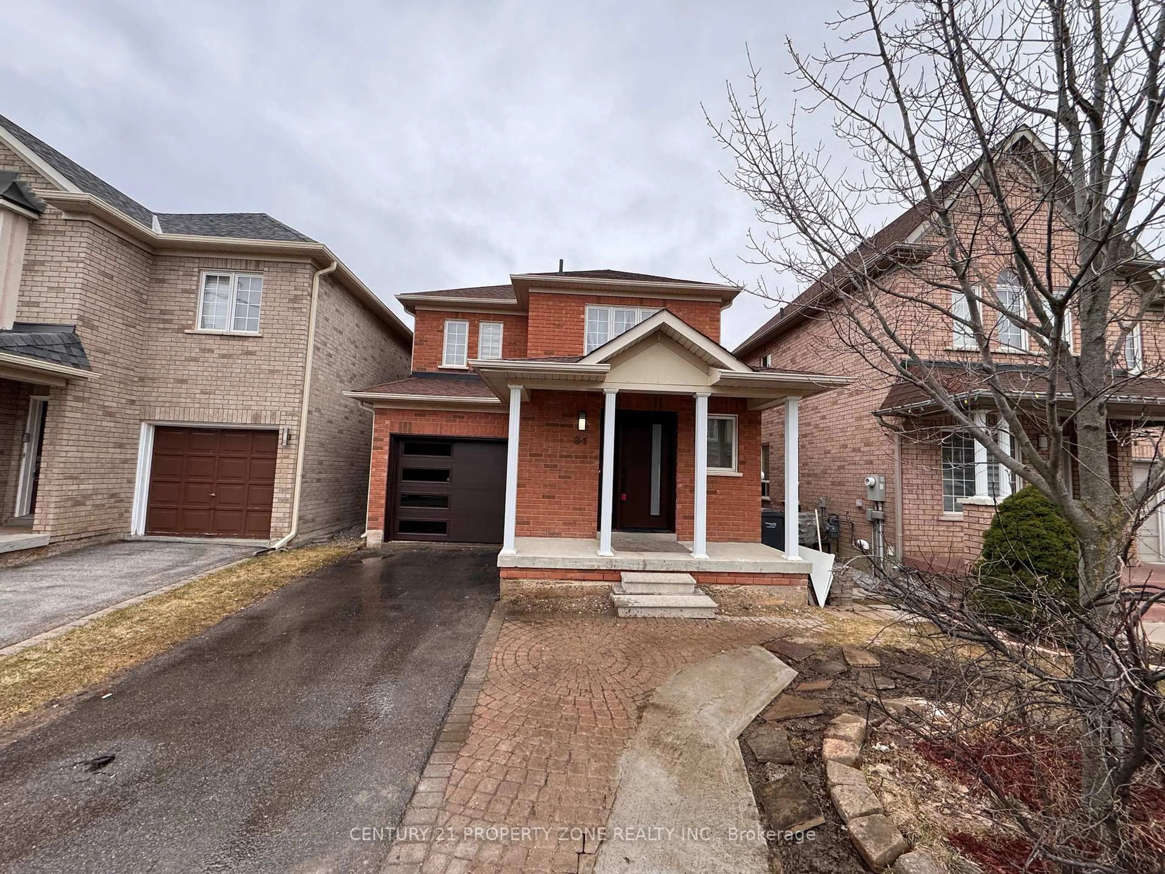 Home with brick exterior material, street for 84 Tideland Dr, Brampton Ontario L7A 2W1
