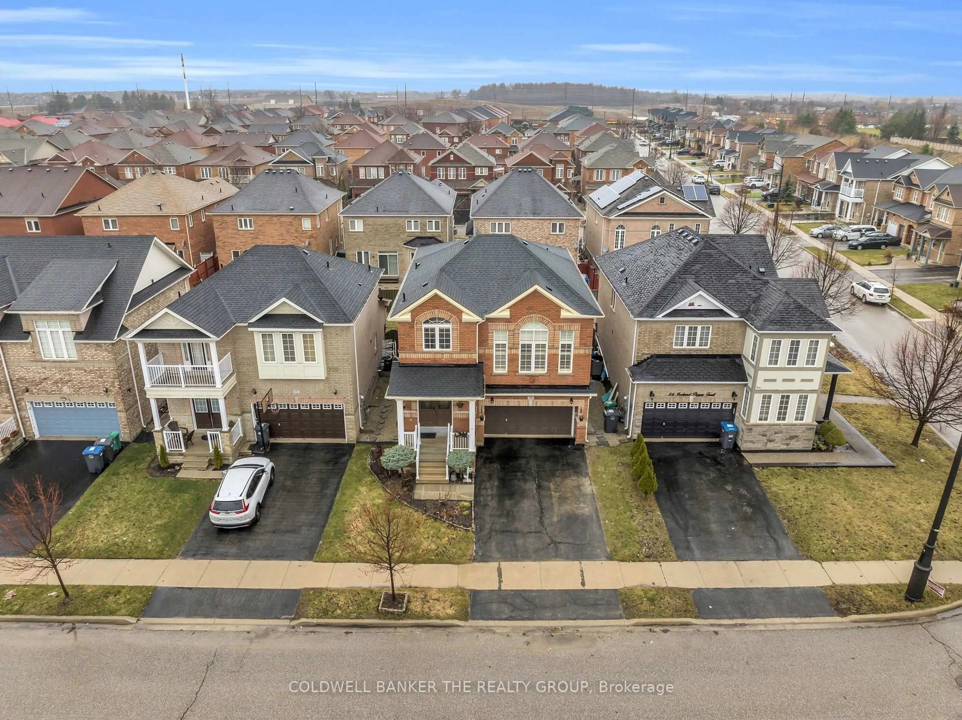 A pic from outside/outdoor area/front of a property/back of a property/a pic from drone, street for 54 Iceland Poppy Tr, Brampton Ontario L7A 0M9