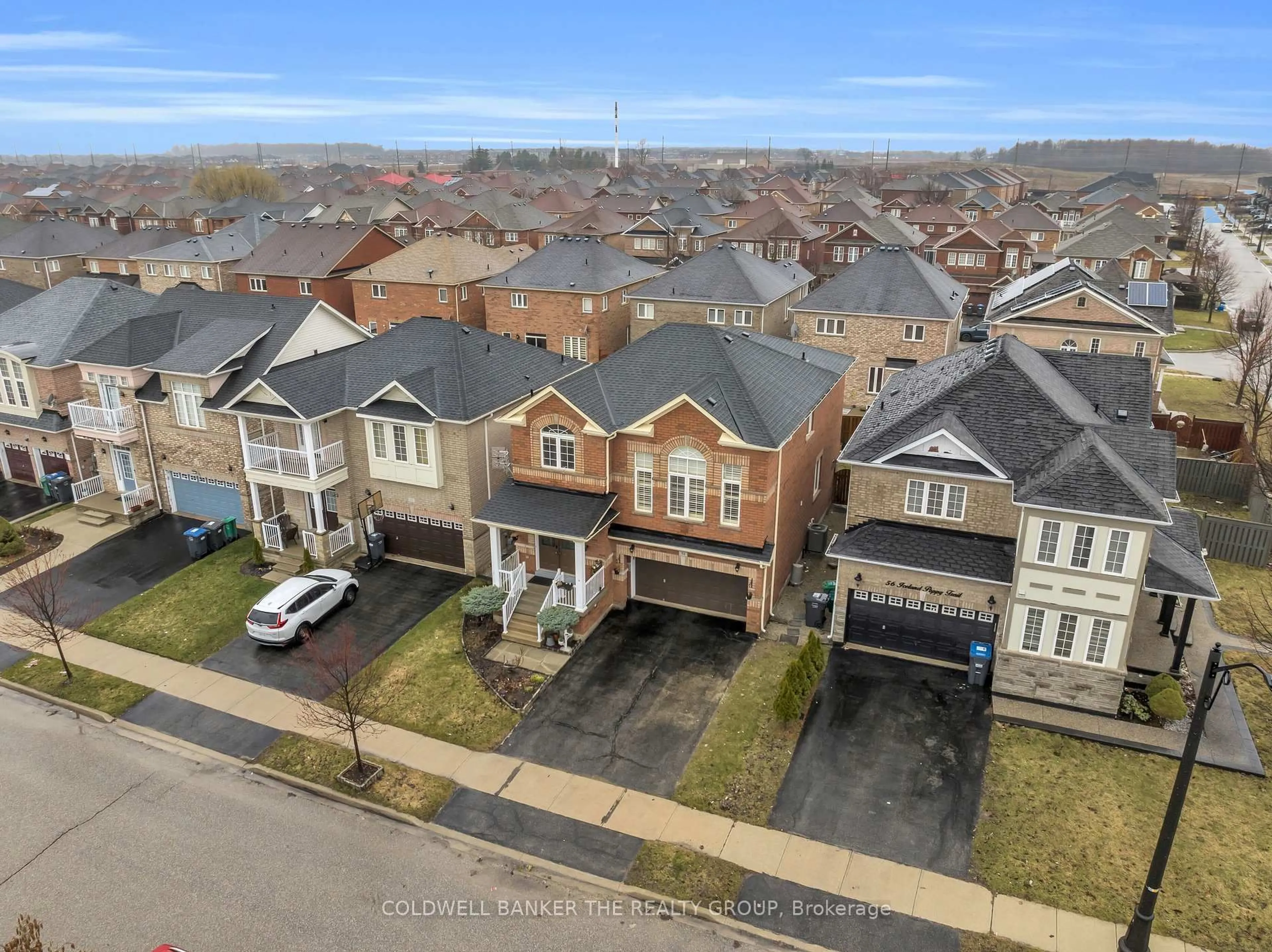 A pic from outside/outdoor area/front of a property/back of a property/a pic from drone, street for 54 Iceland Poppy Tr, Brampton Ontario L7A 0M9
