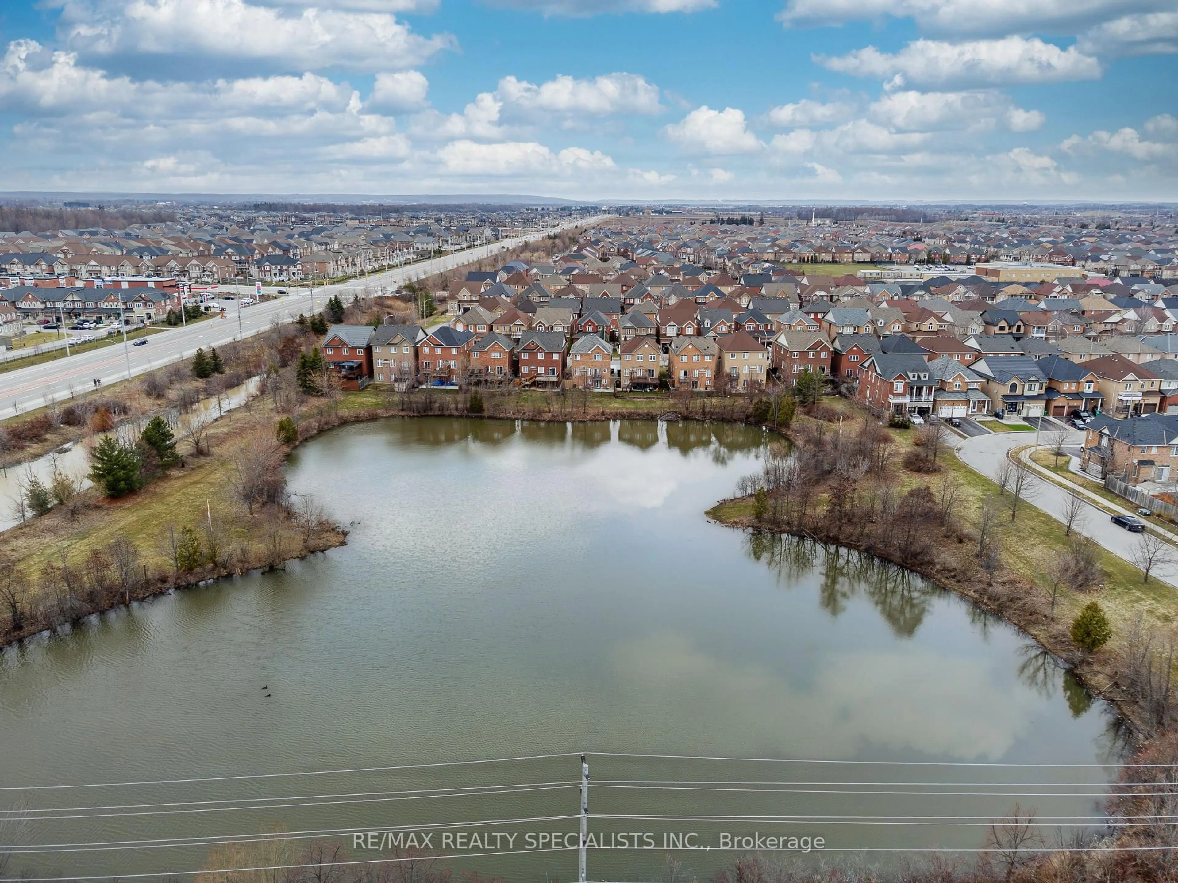 A pic from outside/outdoor area/front of a property/back of a property/a pic from drone, water/lake/river/ocean view for 42 Chalkfarm Cres, Brampton Ontario L7A 3W1