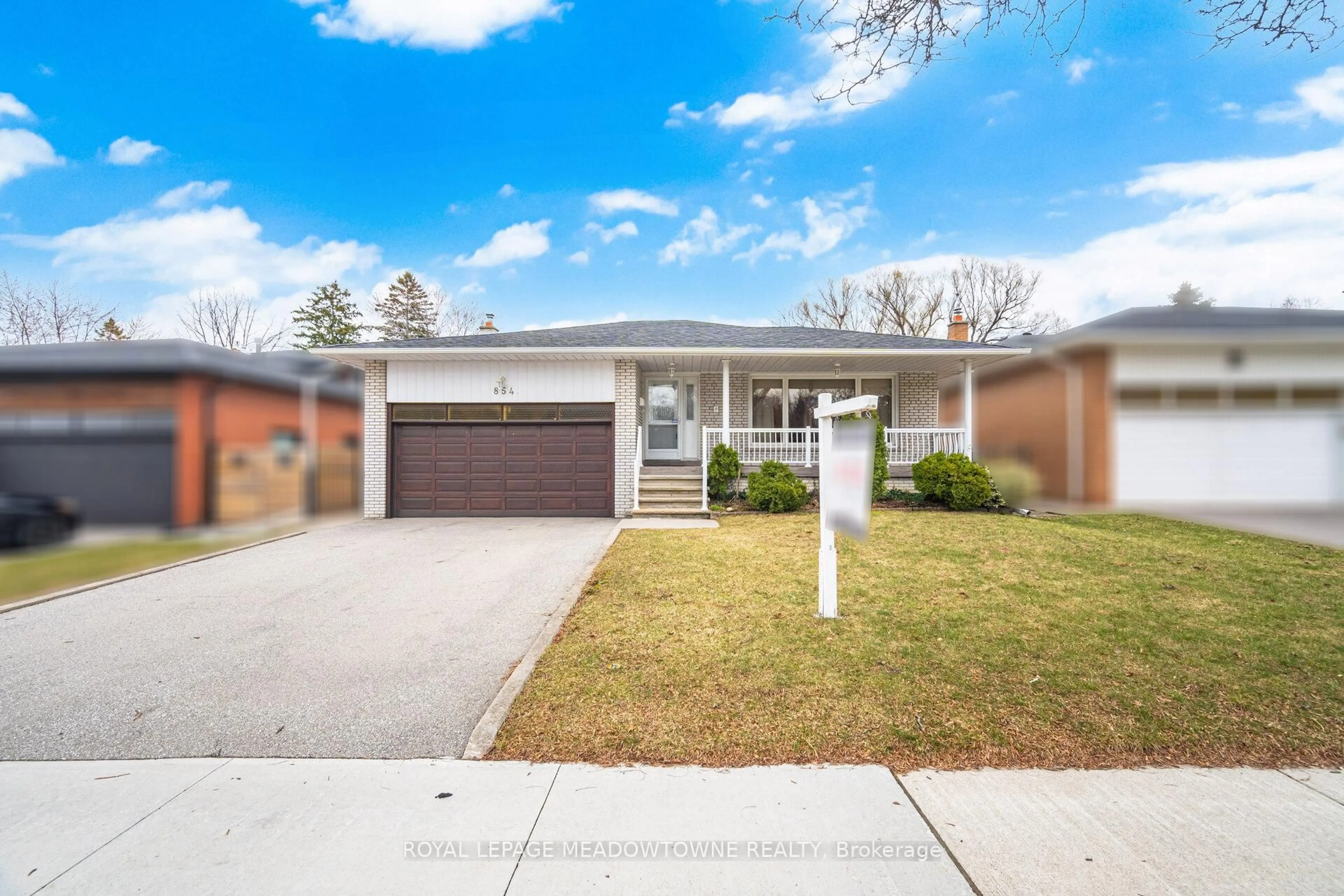 Home with brick exterior material, street for 854 Runningbrook Dr, Mississauga Ontario L4Y 2S1