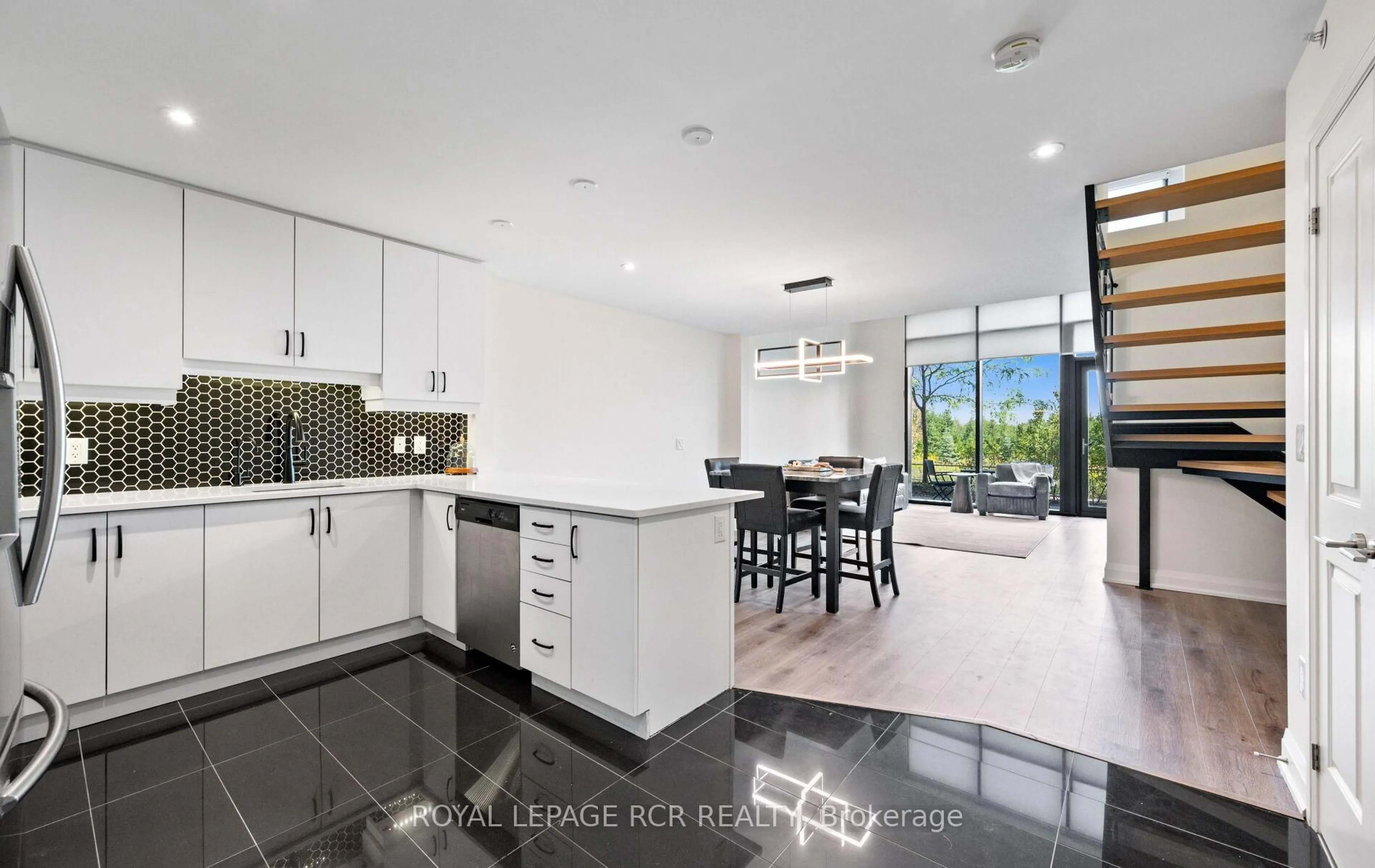 Open concept kitchen, ceramic/tile floor for 65 Yorkland Blvd #107, Brampton Ontario L4C 9Z4