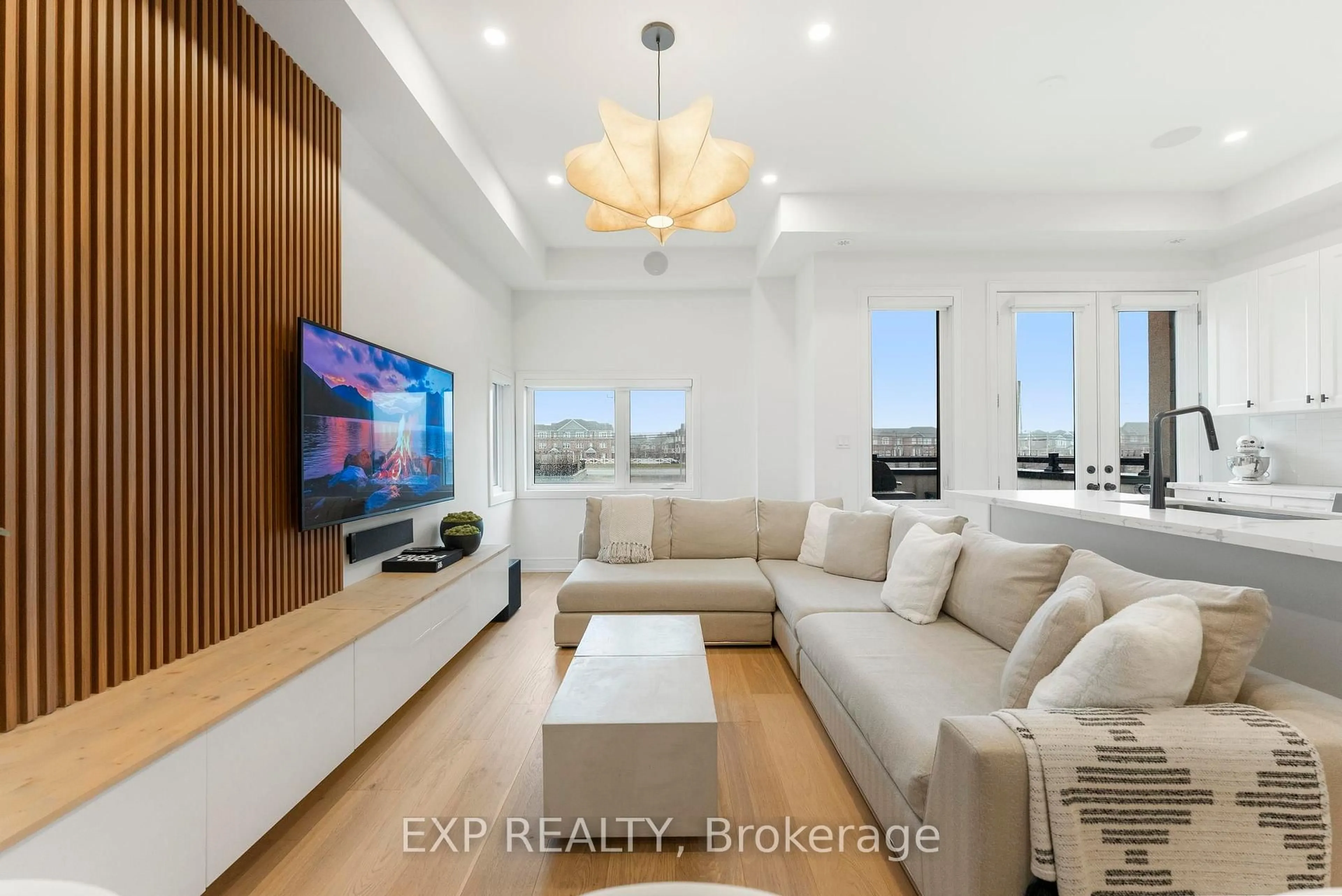 Living room with furniture, wood/laminate floor for 1417 Clarriage Crt, Milton Ontario L9E 1L6