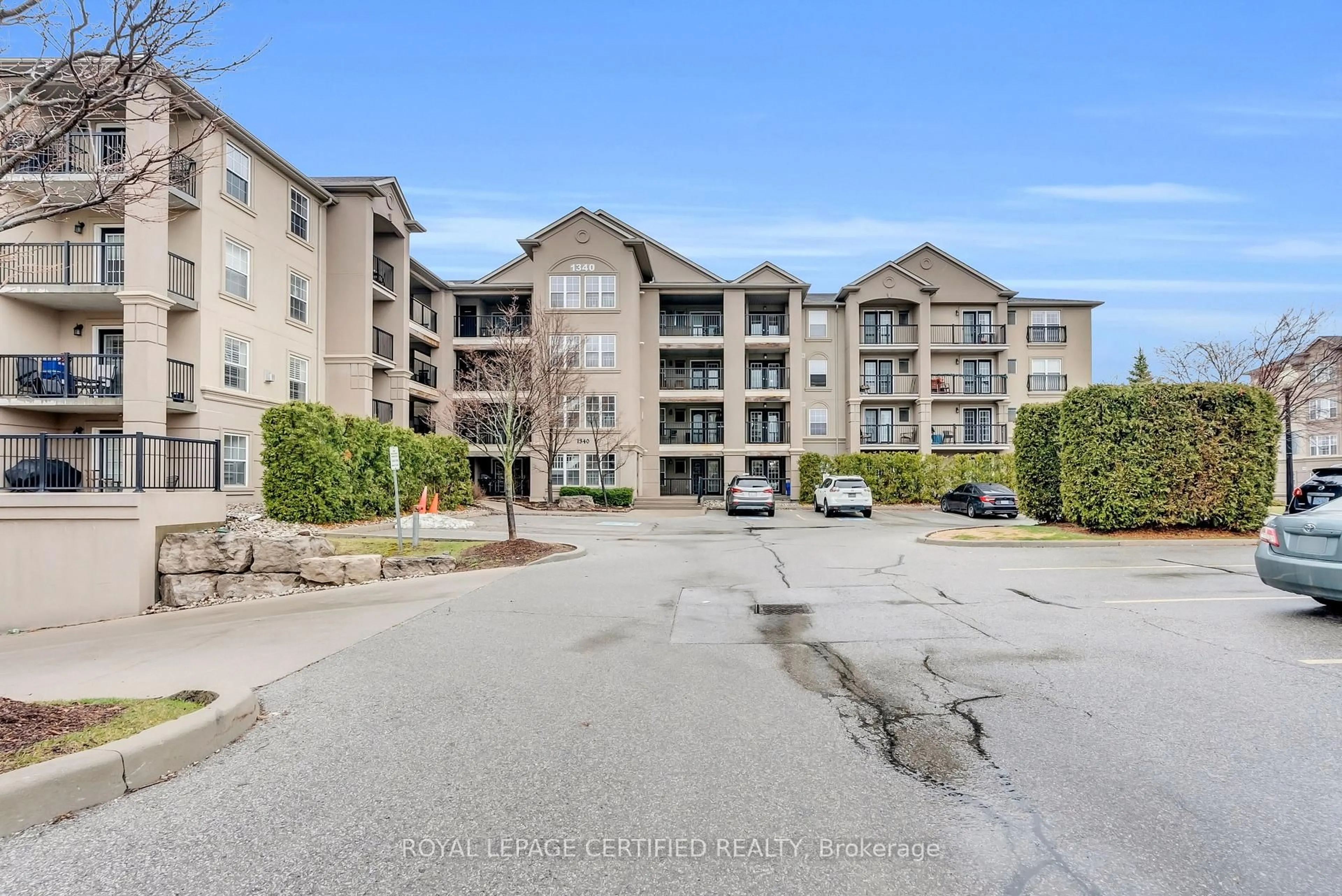 A pic from outside/outdoor area/front of a property/back of a property/a pic from drone, water/lake/river/ocean view for 1340 MAIN St #308, Milton Ontario L9T 7S6