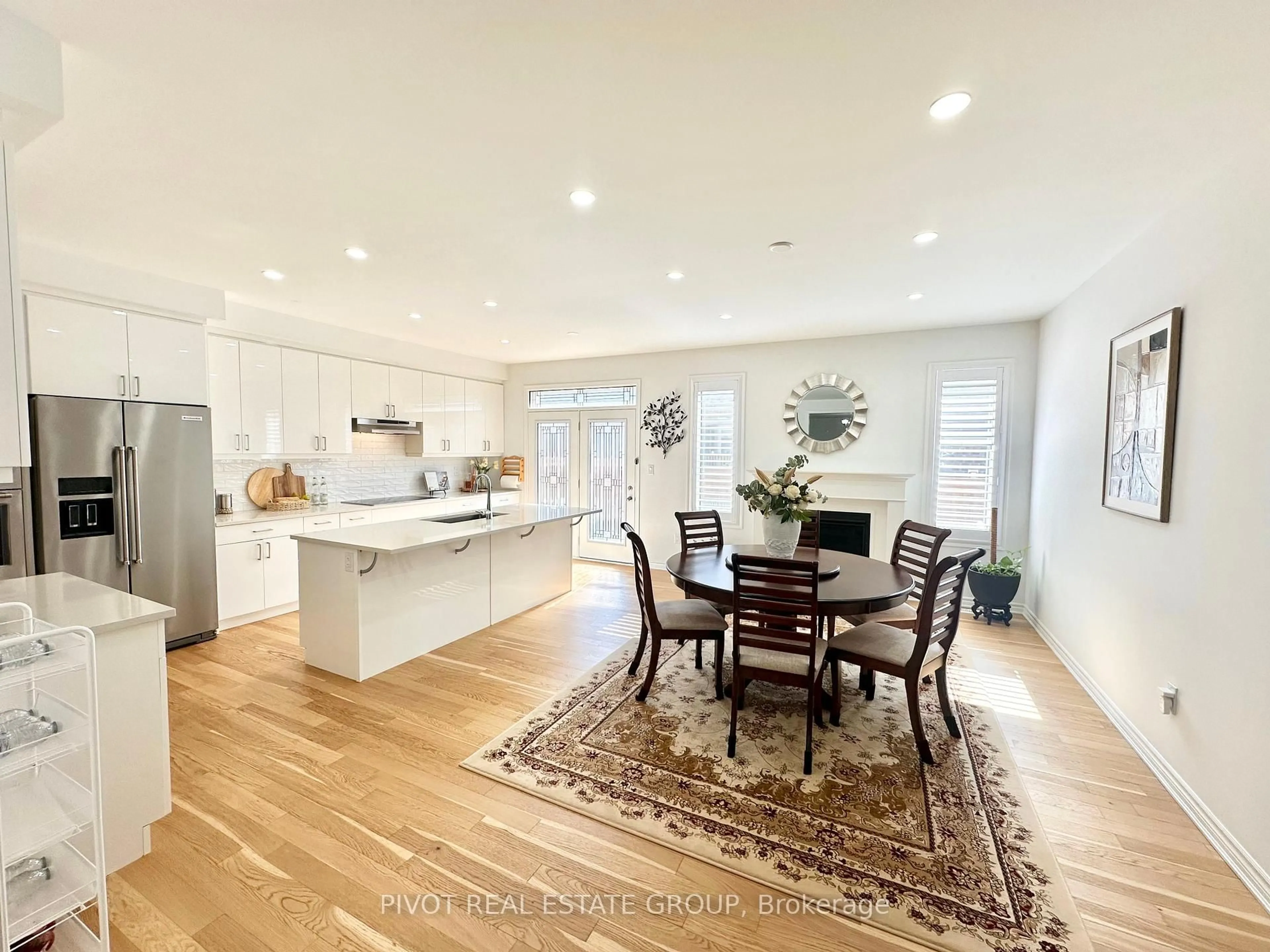 Open concept kitchen, wood/laminate floor for 1226 Muskoka Hts, Milton Ontario L9E 1Y6