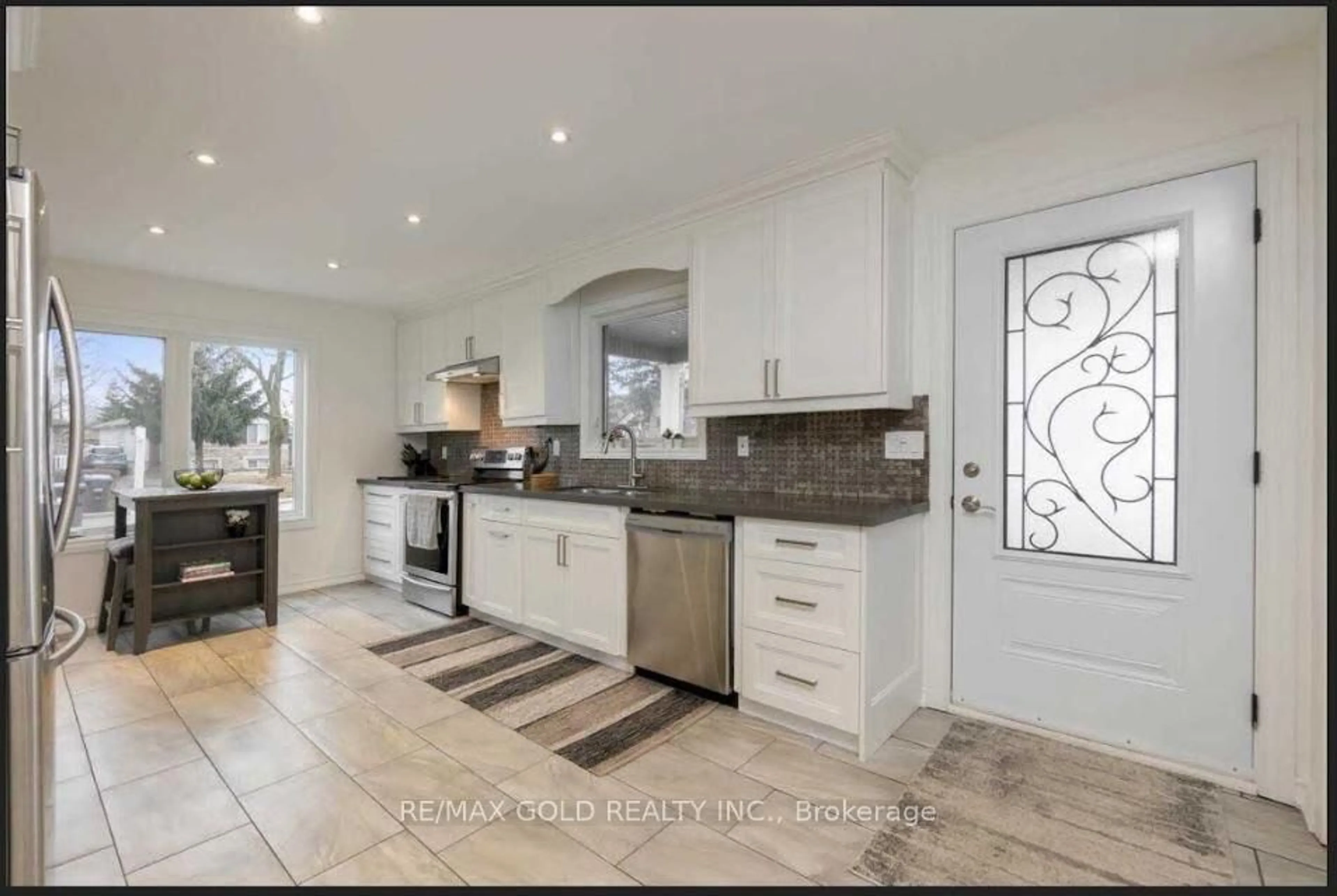 Open concept kitchen, ceramic/tile floor for 59 Royce Ave, Brampton Ontario L6Y 1J8