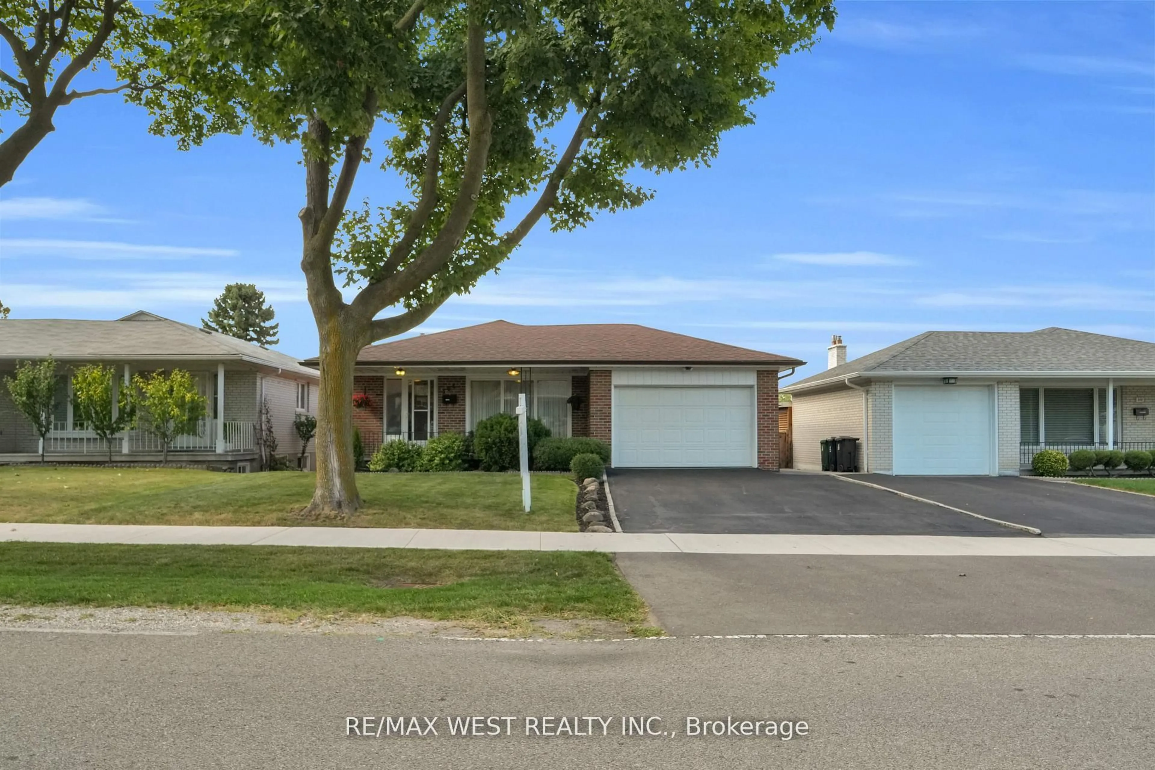 Home with vinyl exterior material, street for 304 La Rose Ave, Toronto Ontario M9P 1B9