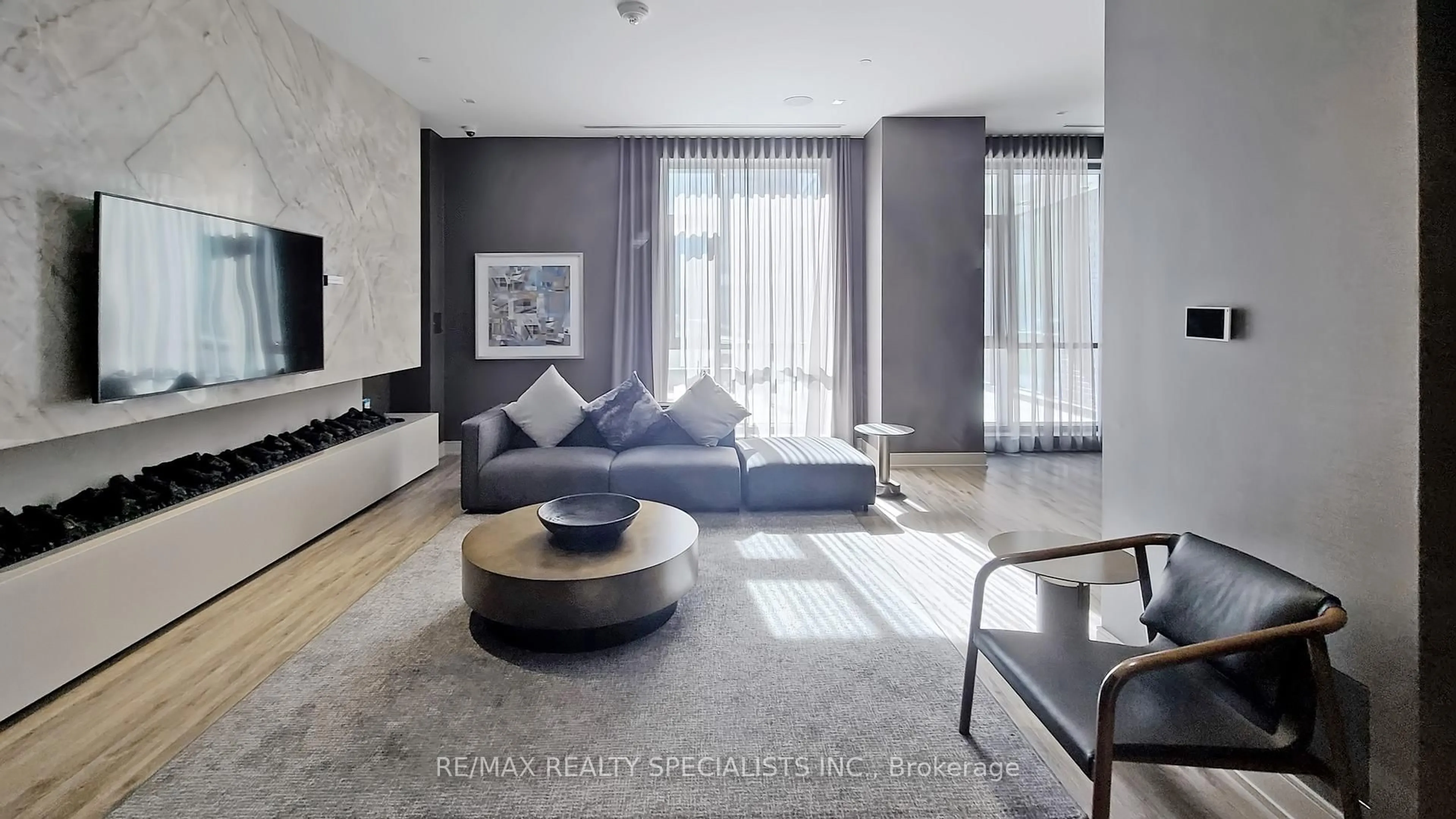 Living room with furniture, unknown for 8 Nahani Way #321, Mississauga Ontario L4Z 0C6