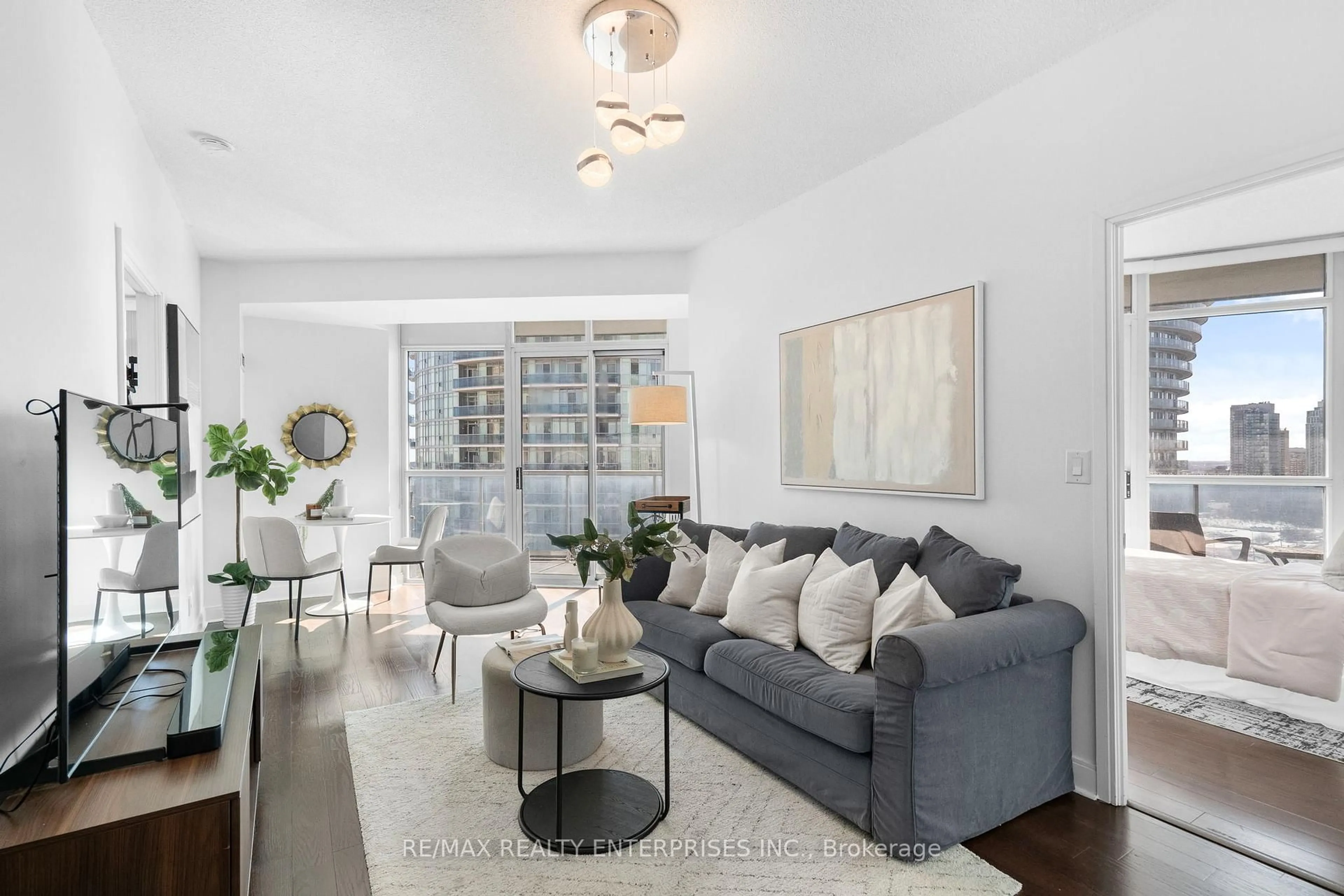 Living room with furniture, unknown for 80 Absolute Ave #2306, Mississauga Ontario L4Z 0A2