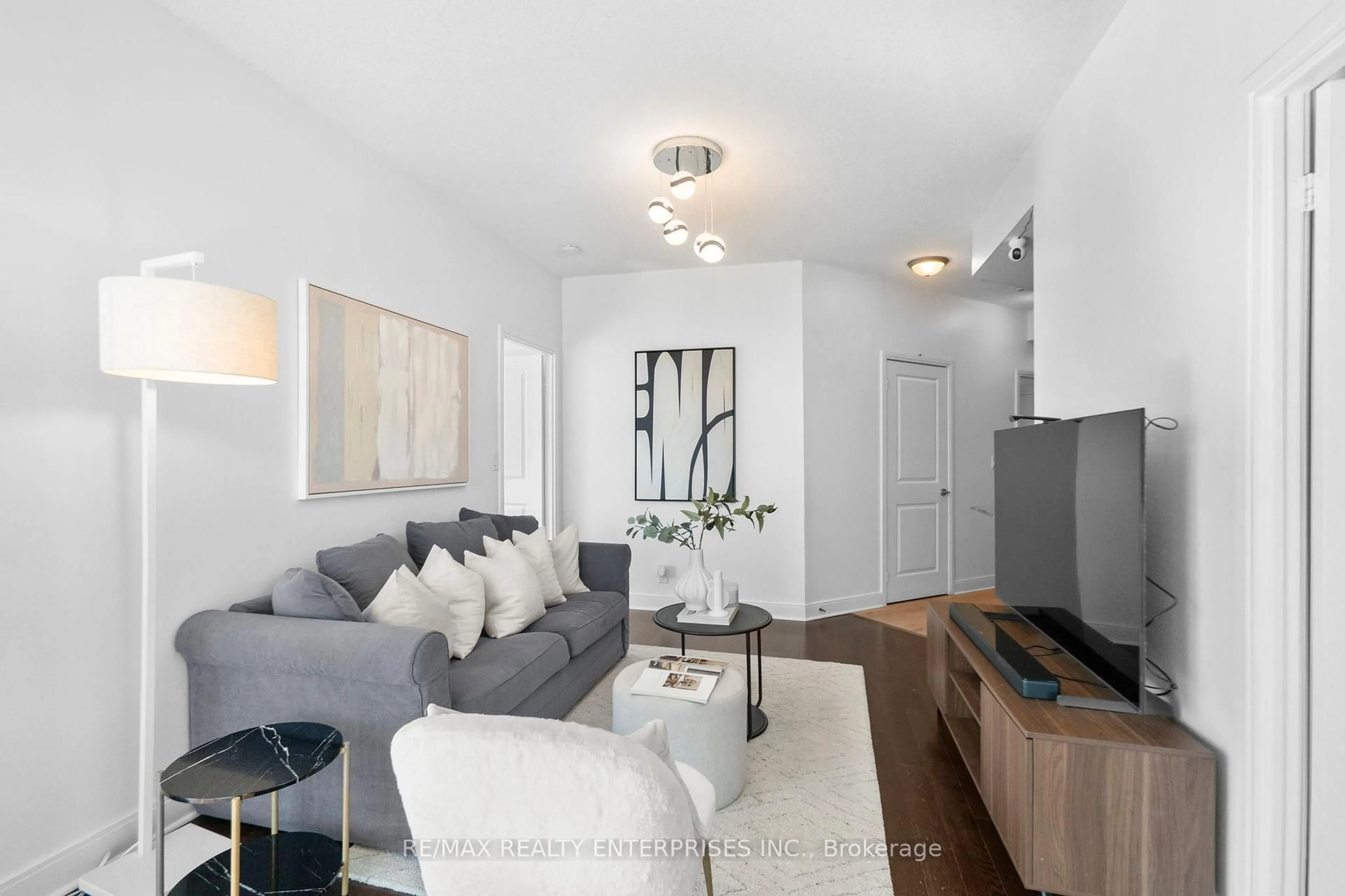 Living room with furniture, unknown for 80 Absolute Ave #2306, Mississauga Ontario L4Z 0A2