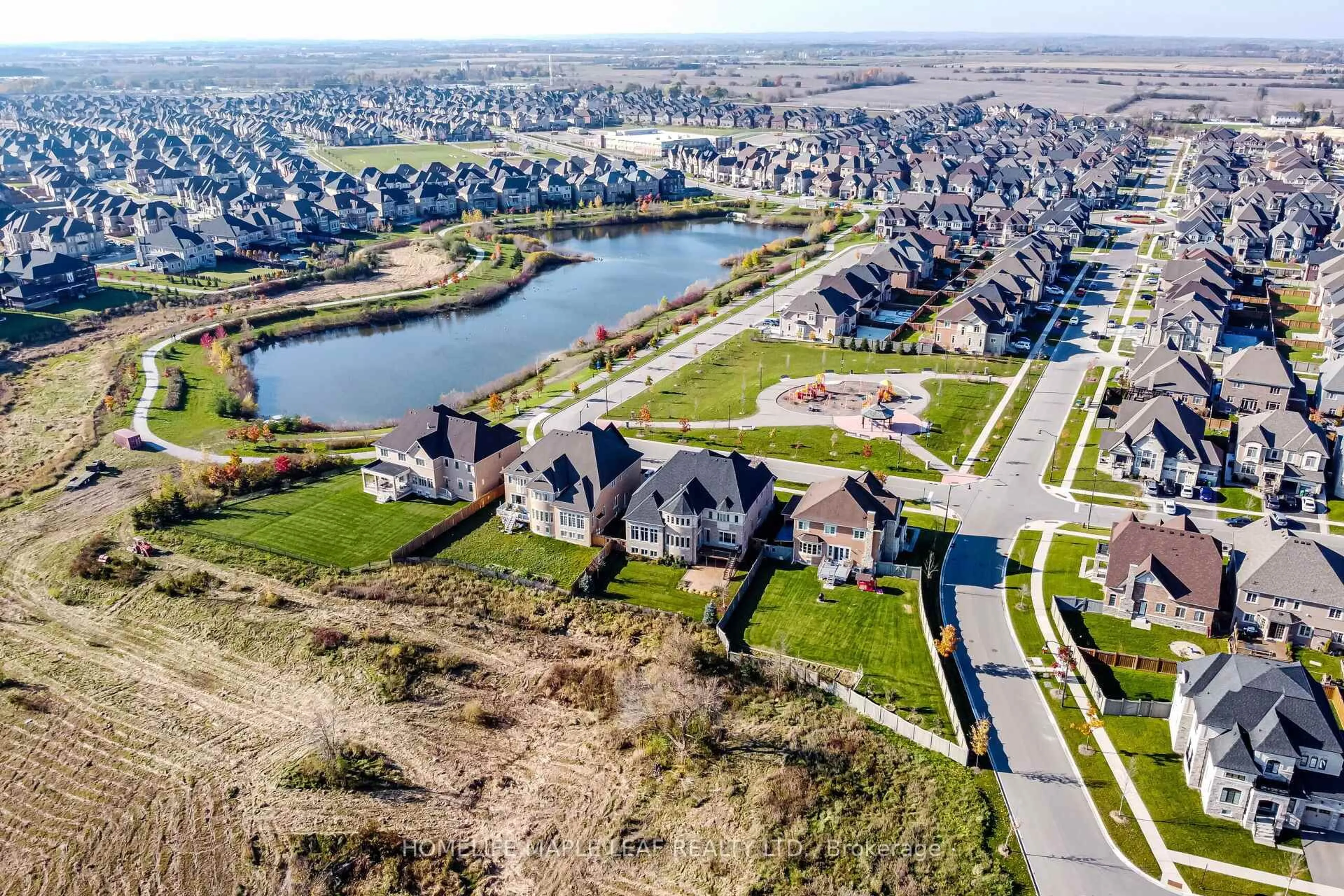 A pic from outside/outdoor area/front of a property/back of a property/a pic from drone, water/lake/river/ocean view for 44 Herringbone Cres, Brampton Ontario L6P 4B8