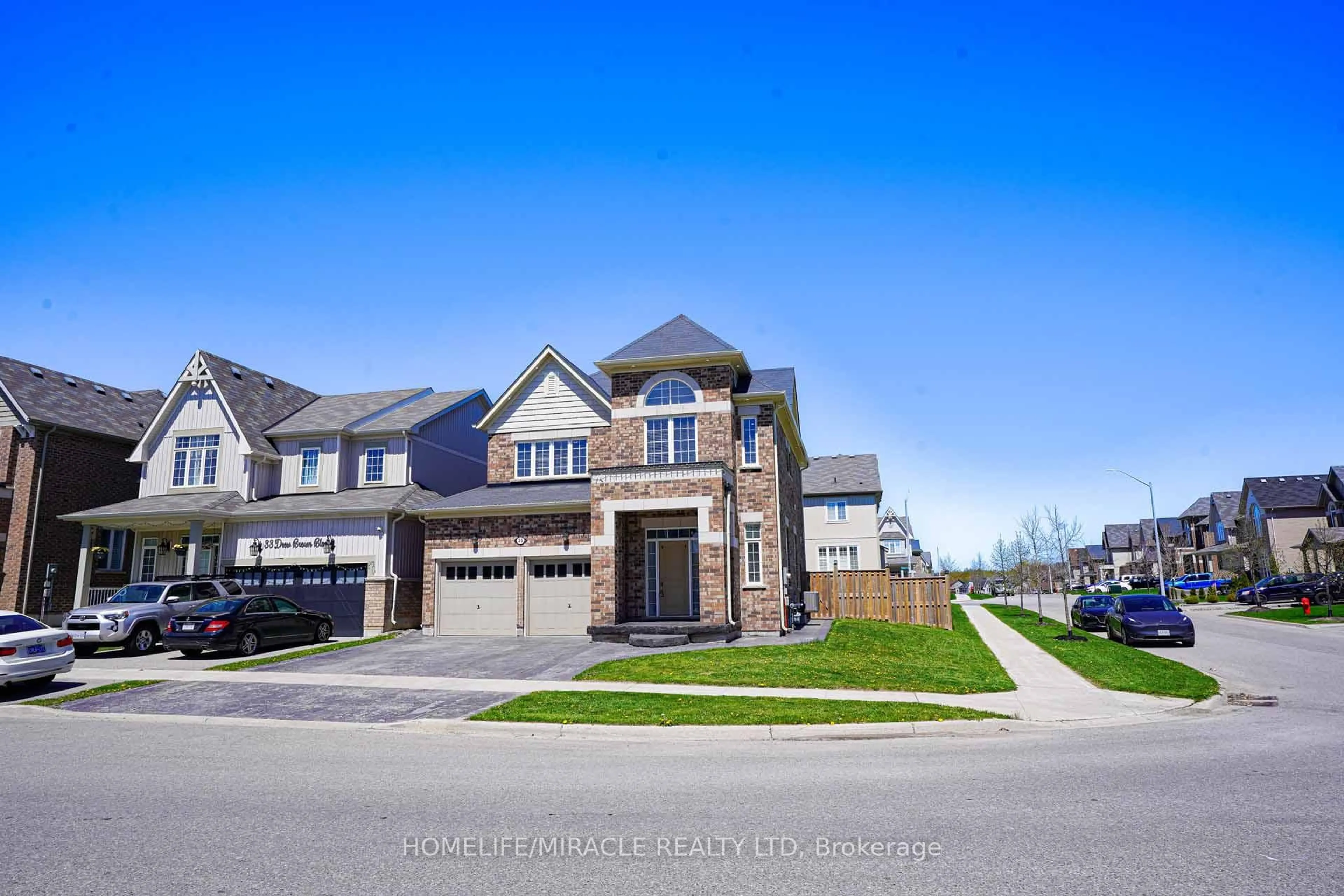 Home with brick exterior material, street for 35 Drew Brown Blvd, Orangeville Ontario L9W 6Z6