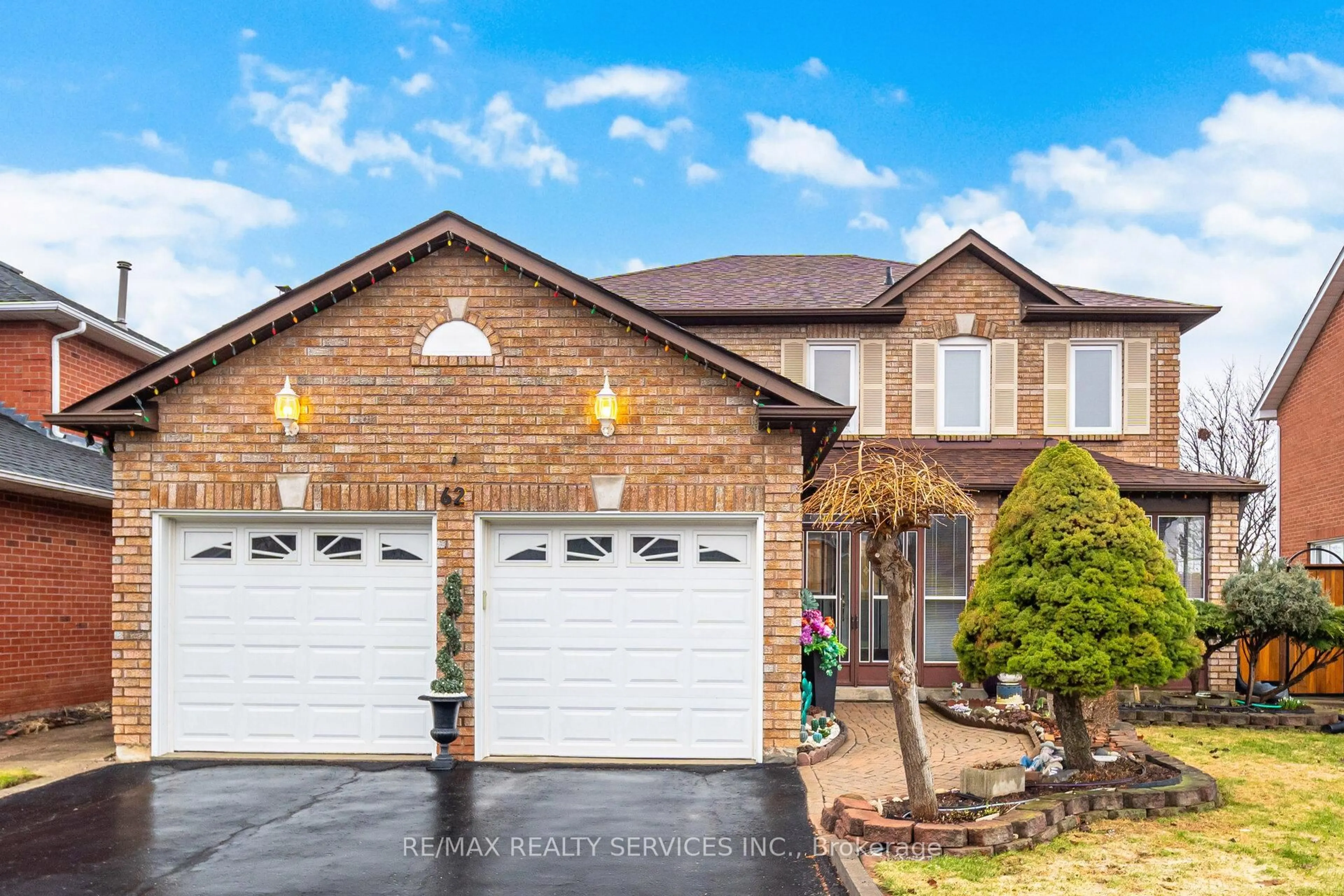 Home with brick exterior material, street for 62 Fernbrook Cres, Brampton Ontario L6Z 3N7