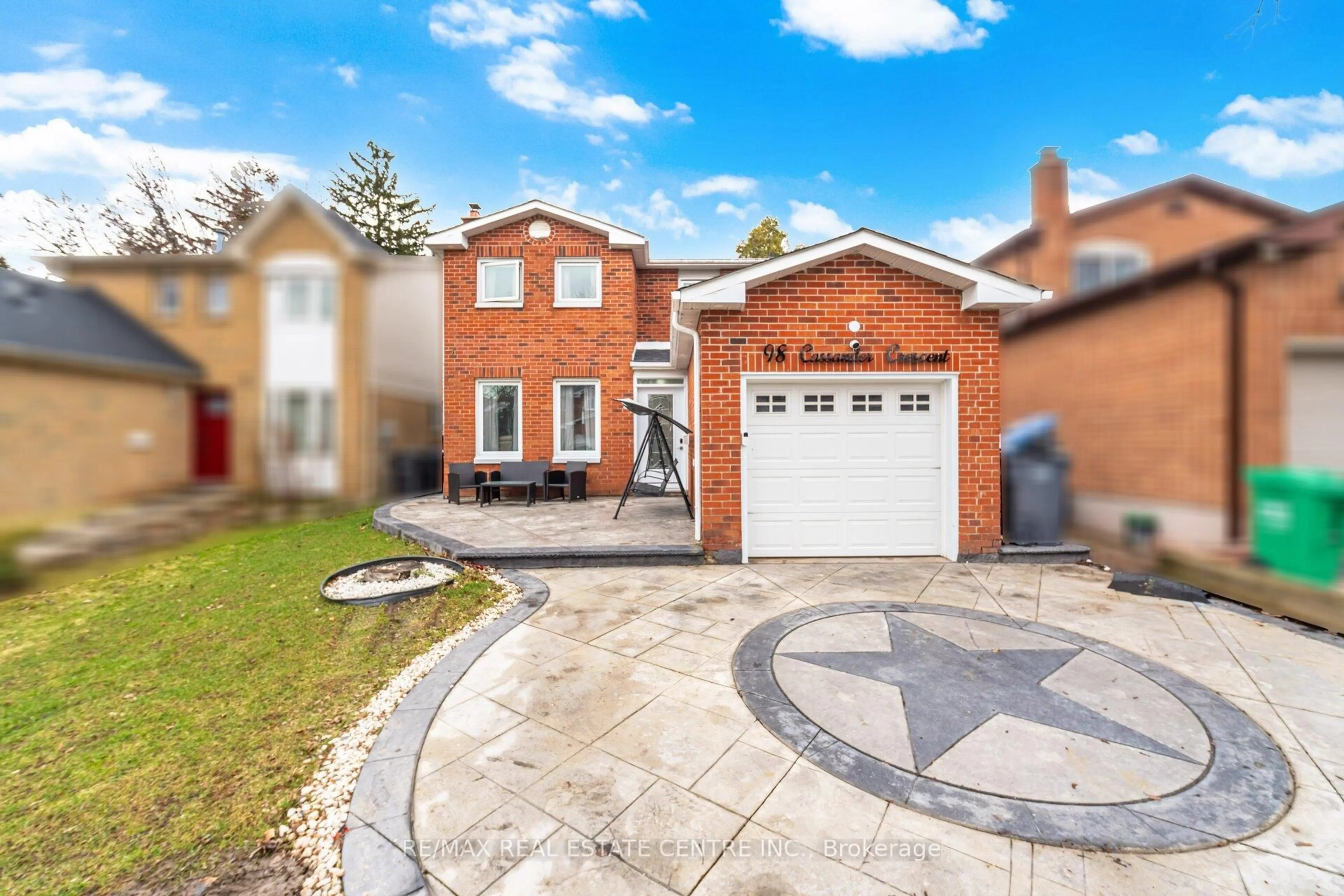 Home with brick exterior material, street for 98 Cassander Cres, Brampton Ontario L6Z 1Z2