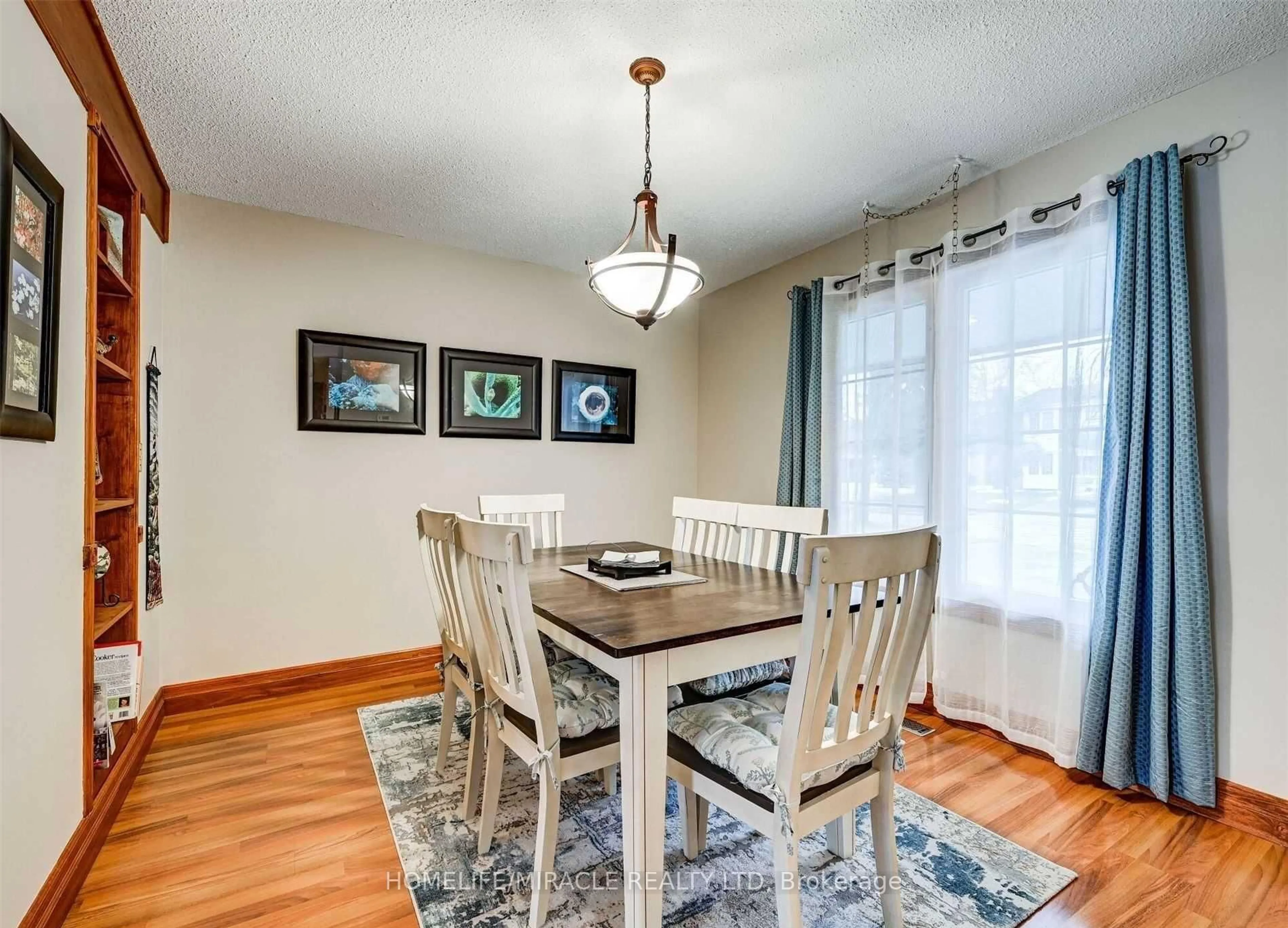 Dining room, wood/laminate floor for 2 Cantrill Crt, Brampton Ontario L6Z 1A3