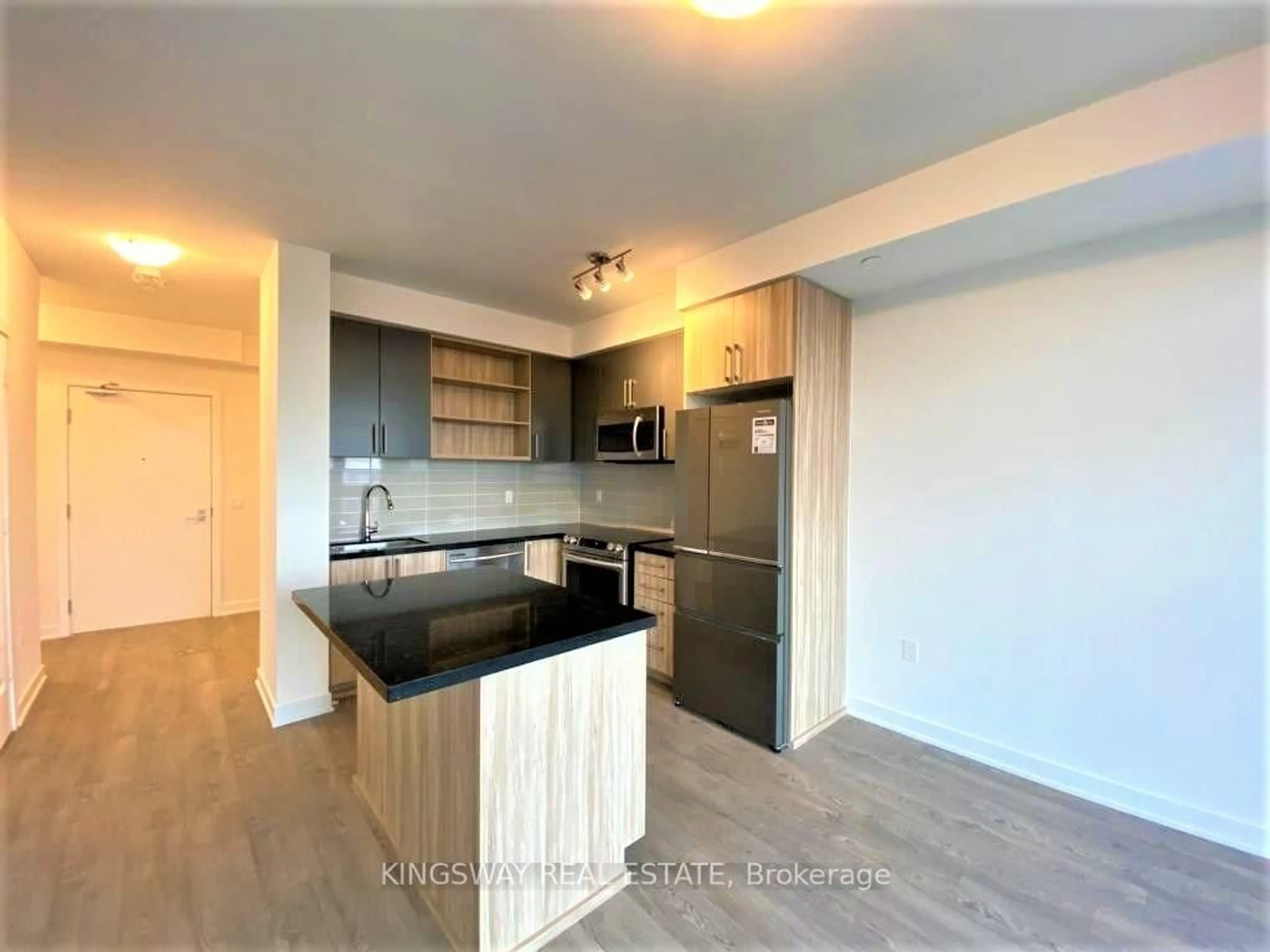 Open concept kitchen, wood/laminate floor for 4699 Glen Erin Dr #1403, Mississauga Ontario L5M 2E5