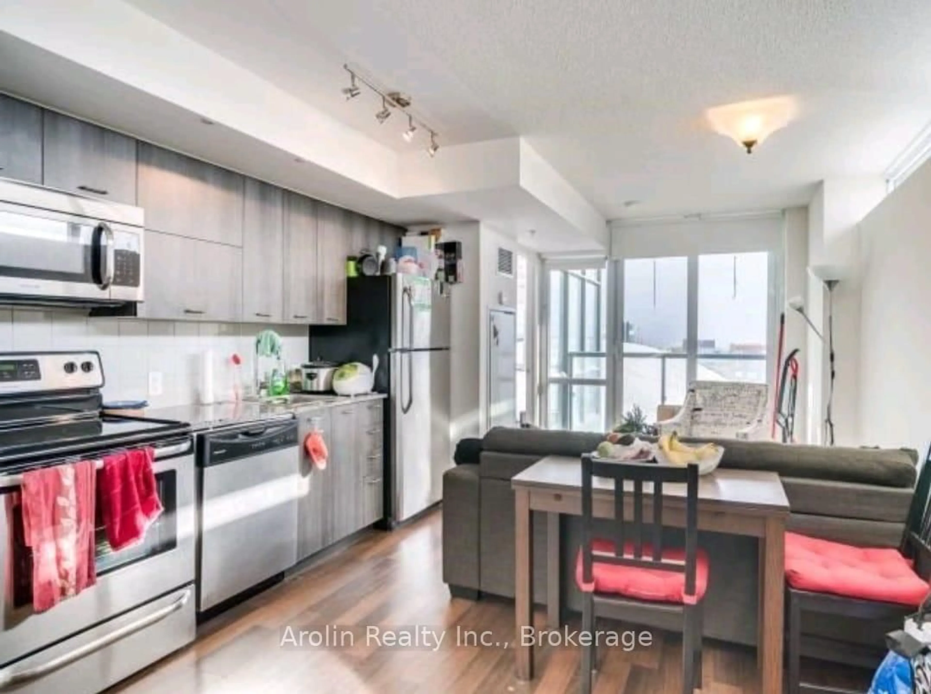 Open concept kitchen, unknown for 20 Joe Shuster Way #212, Toronto Ontario M6K 0A3
