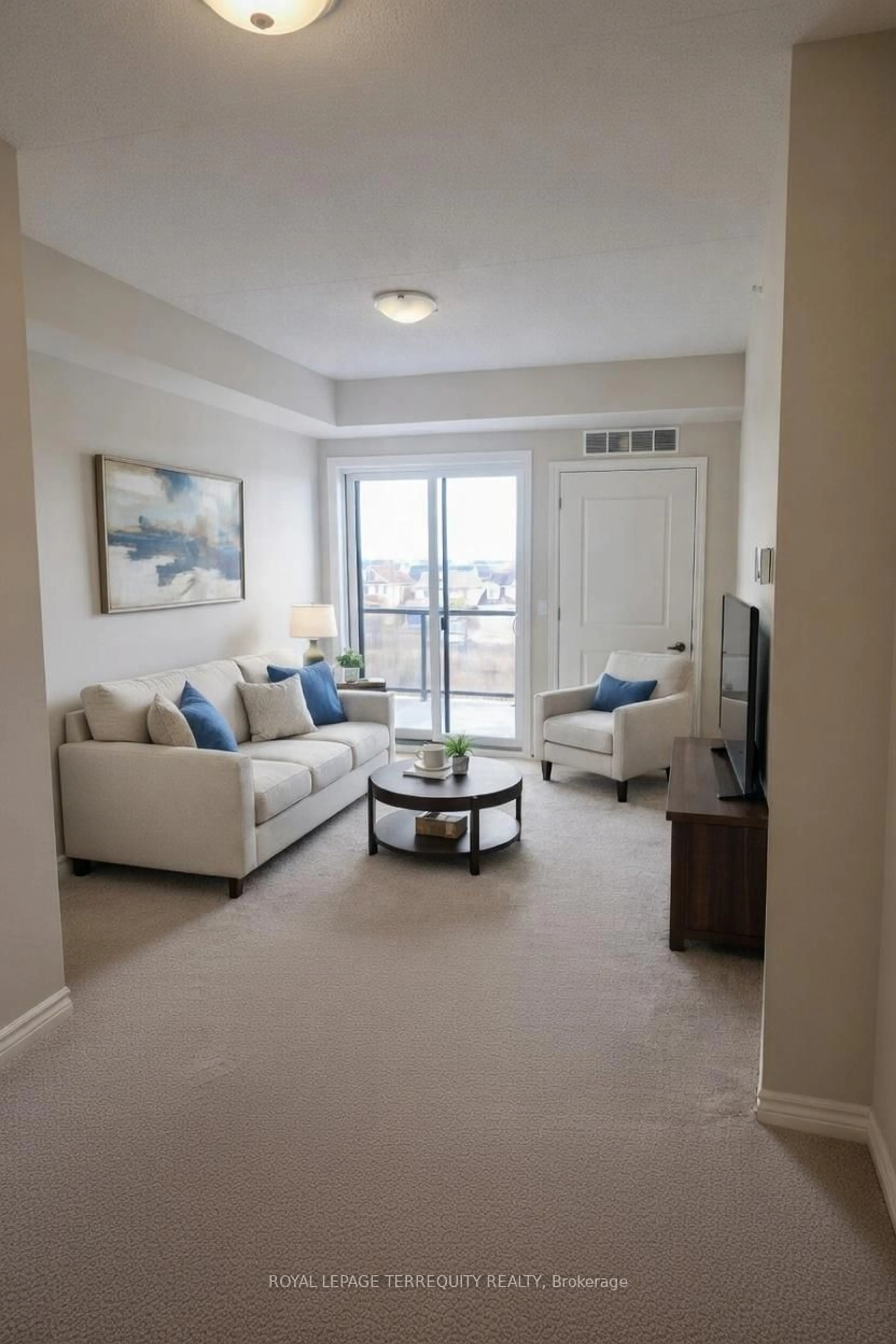 Living room with furniture, unknown for 630 Sauve St #321, Milton Ontario L9T 9A6