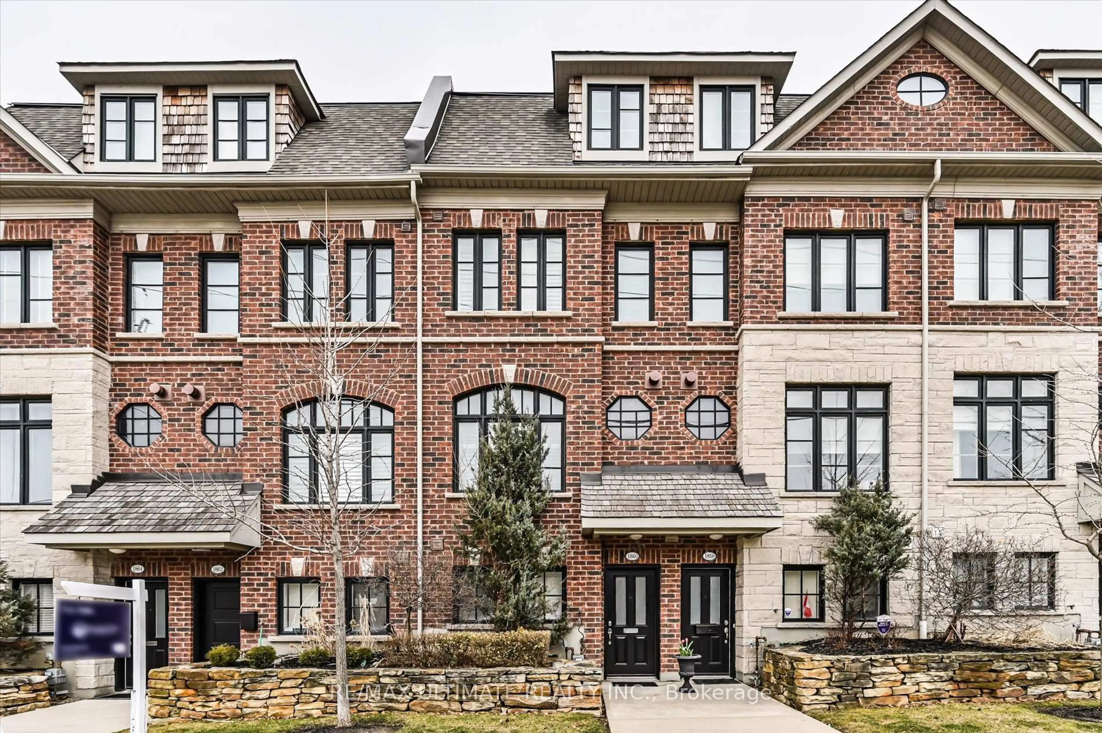 Home with brick exterior material, street for 1860 Burnhamthorpe Rd, Mississauga Ontario L4X 2S5