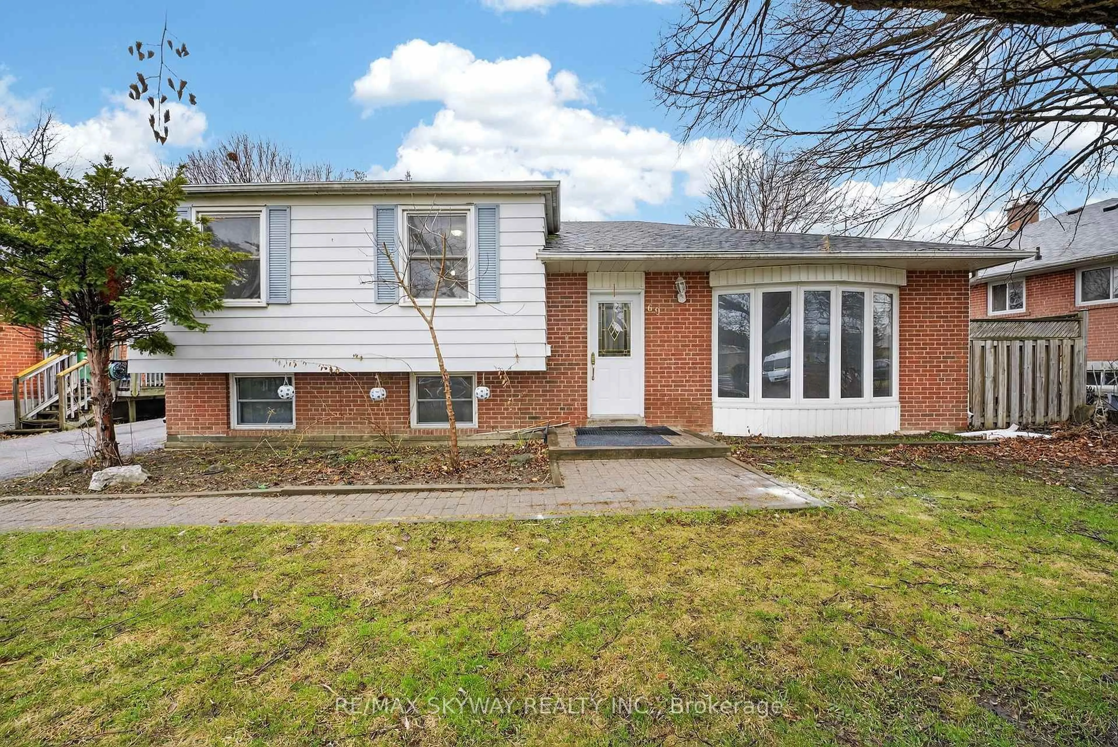 Home with brick exterior material, street for 69 Argyle Cres, Brampton Ontario L6T 1M9