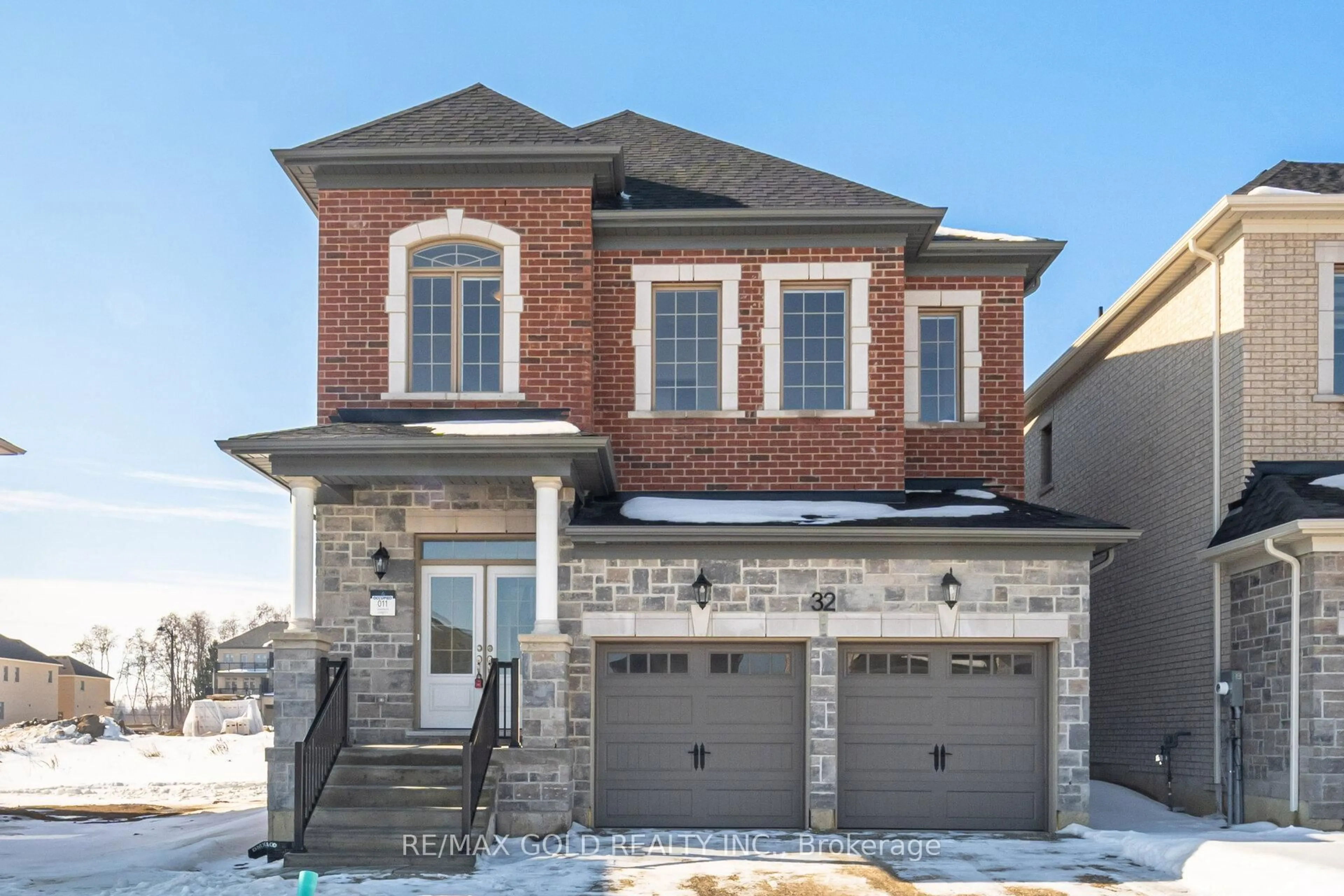 Home with brick exterior material, street for 32 Addison St, Caledon Ontario L7C 4N2