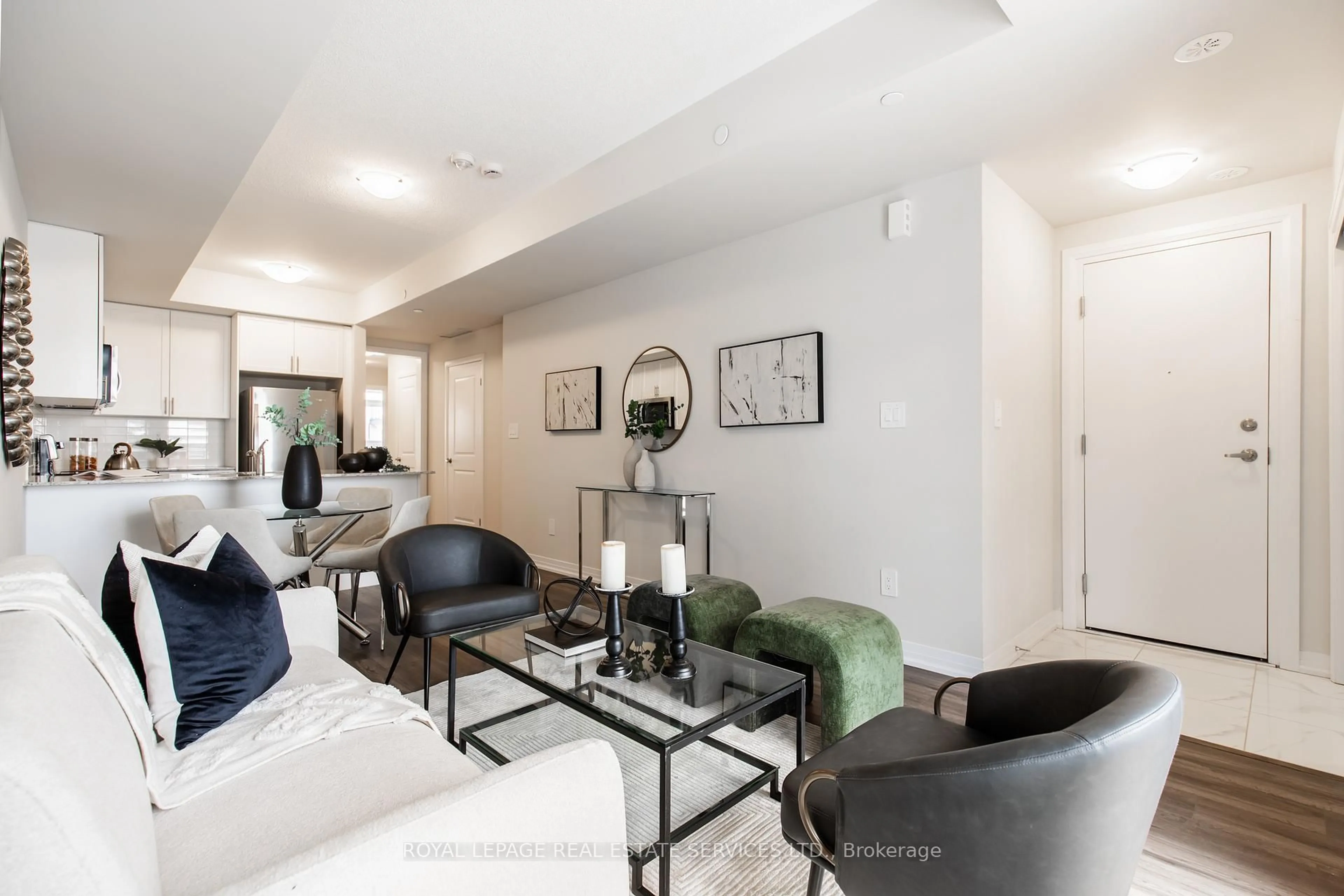 Living room with furniture, unknown for 1597 Rose Way #107, Milton Ontario L9E 1N4