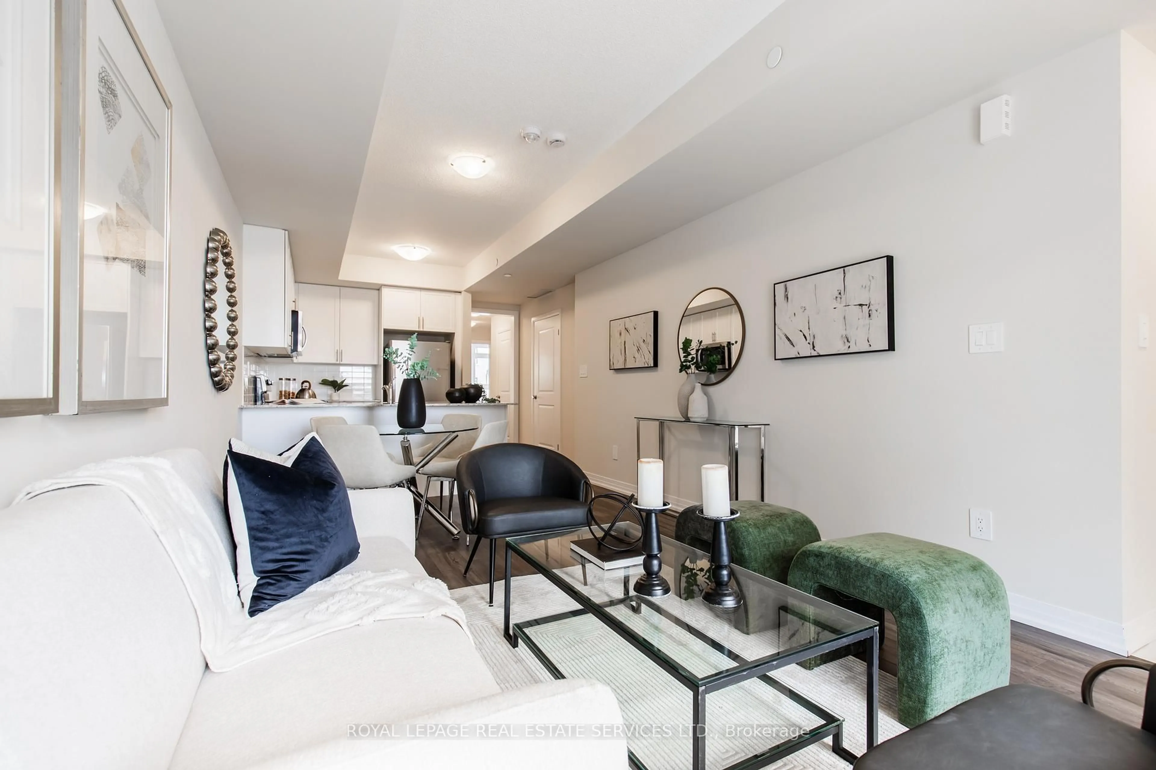 Living room with furniture, unknown for 1597 Rose Way #107, Milton Ontario L9E 1N4